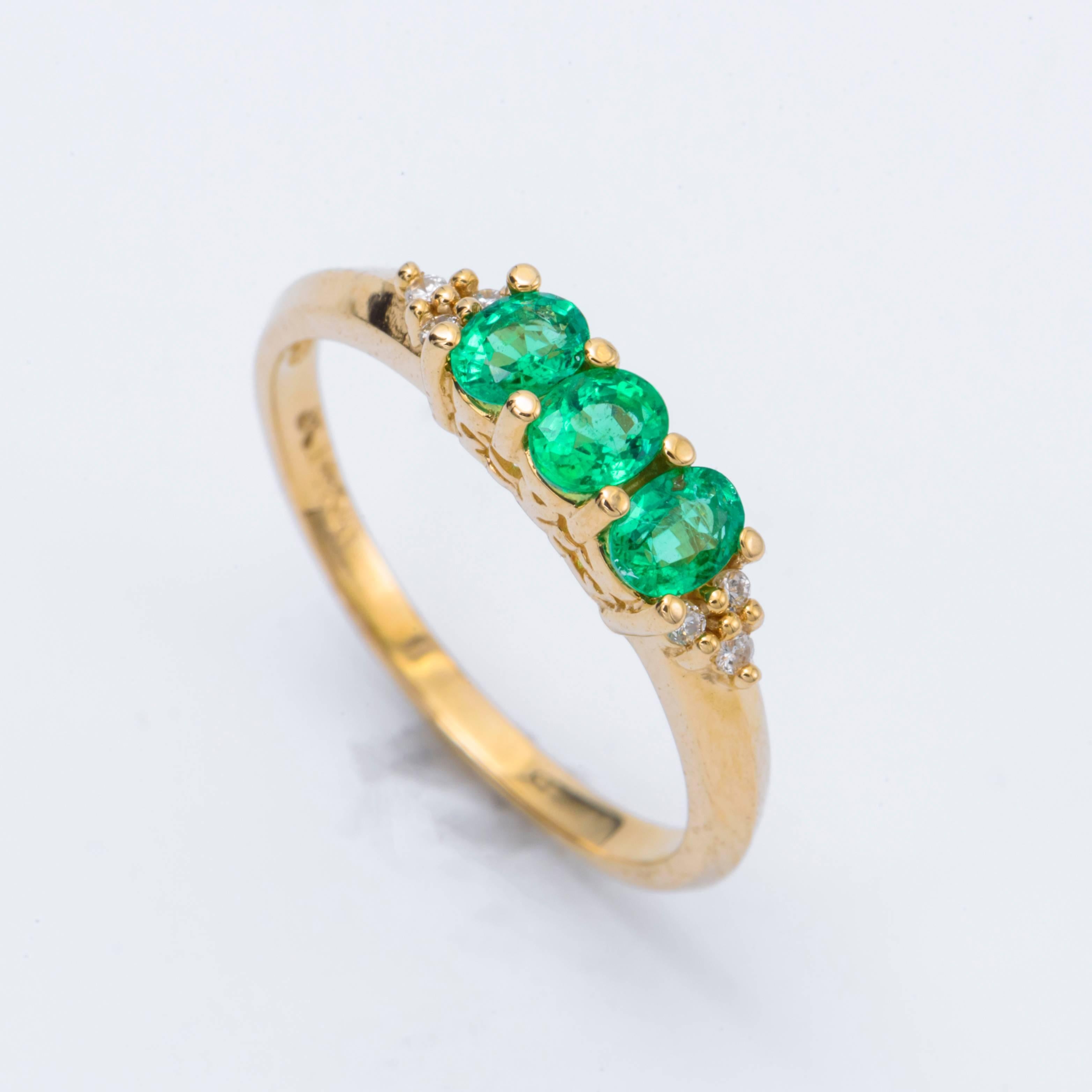 Contemporary Oval Emerald Tree Stone Ring and Diamond Accent 14 Karat Yellow Gold Band