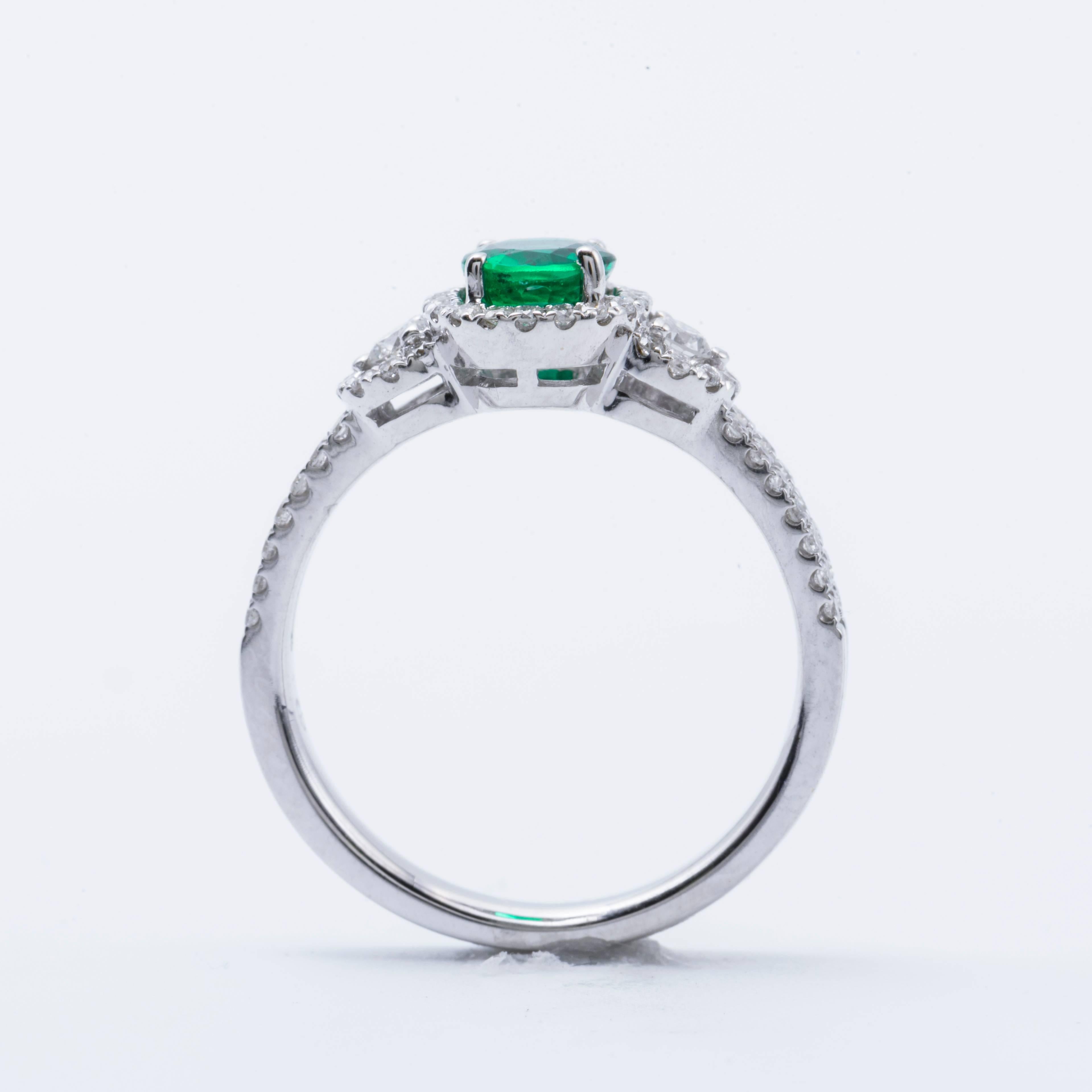 Contemporary Oval Shape Emerald Diamond Gold Halo Engagement Cocktail Ring