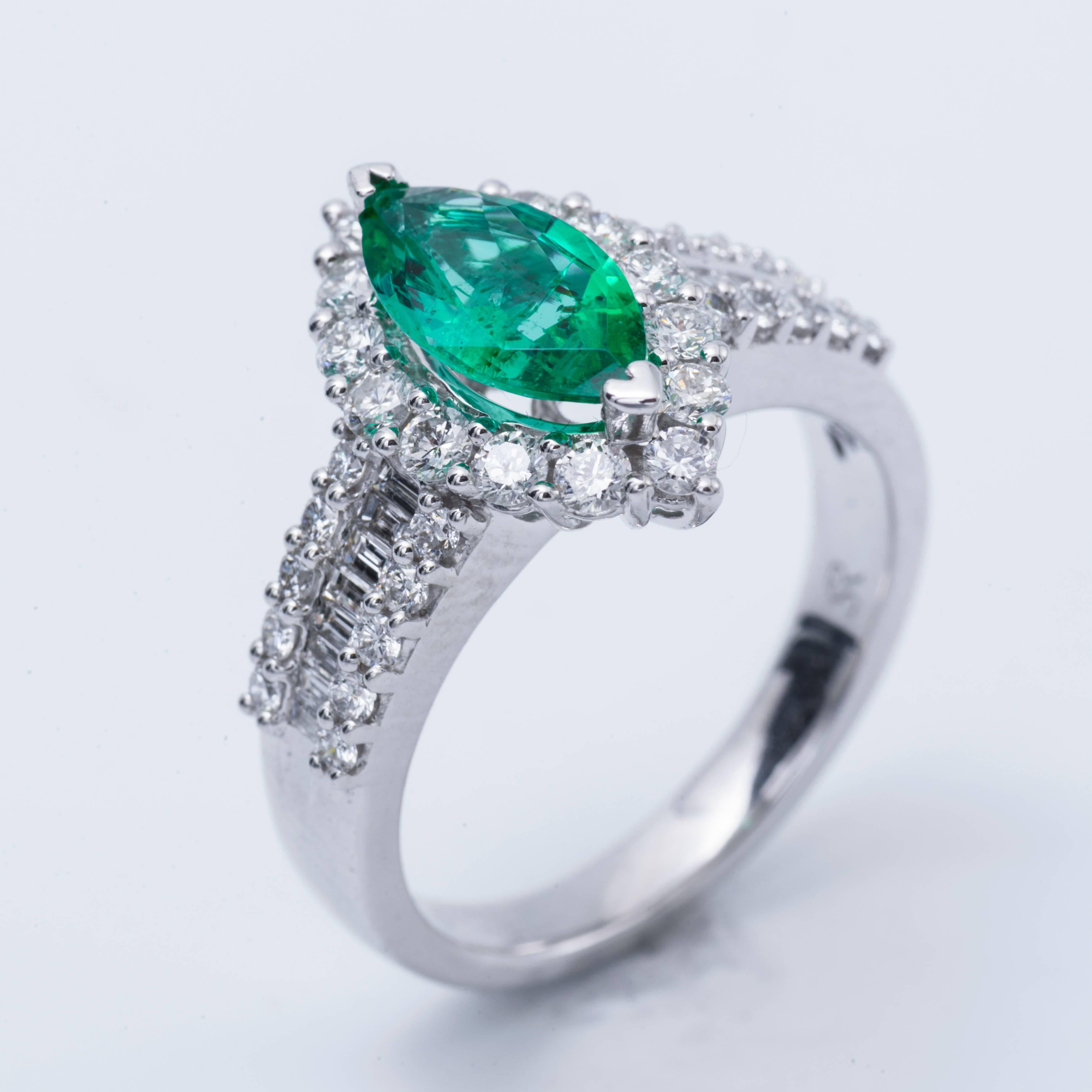 marquise cut emerald engagement rings