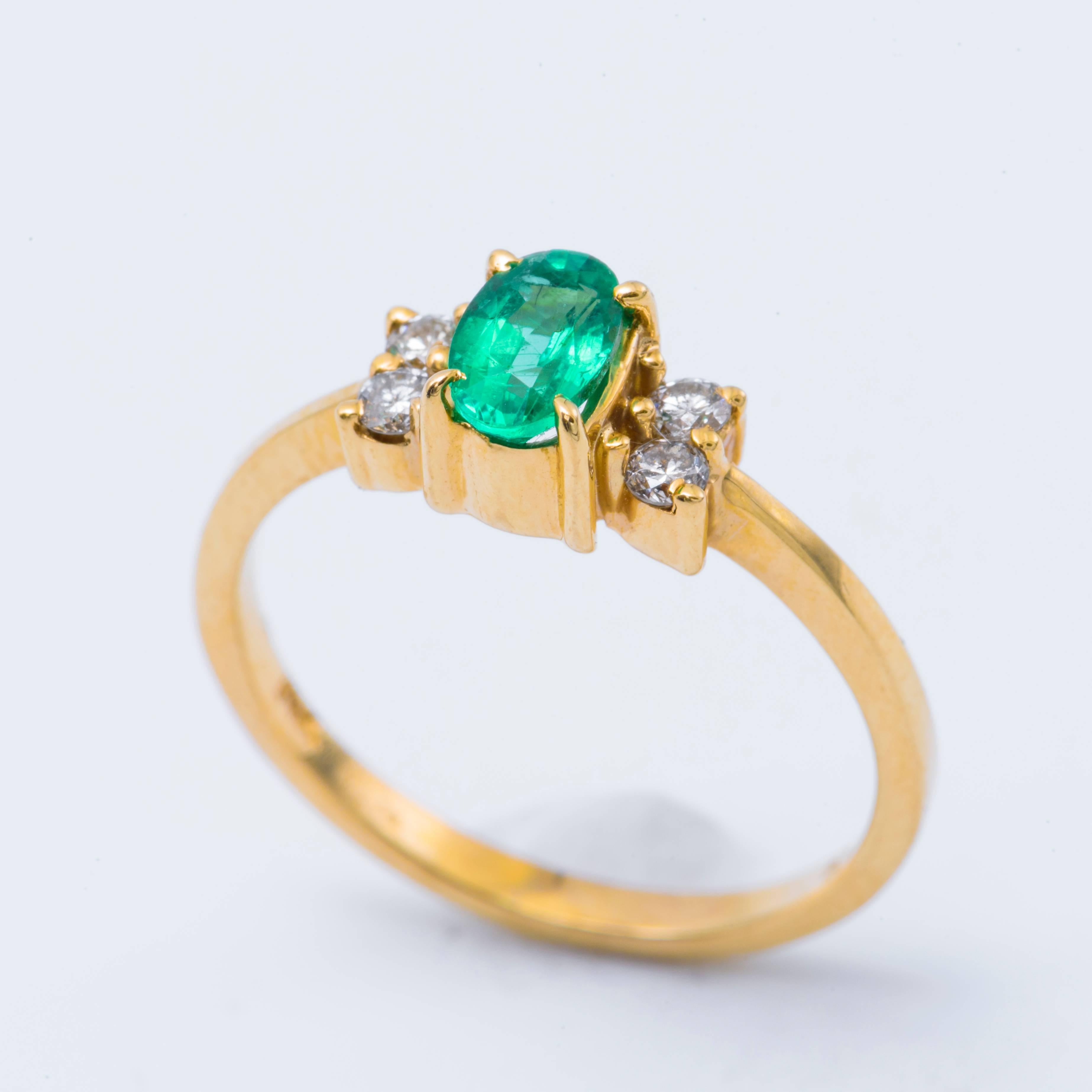 Oval Shaped Emerald and Diamond Engagement Ring in Yellow Gold In New Condition In New York, NY