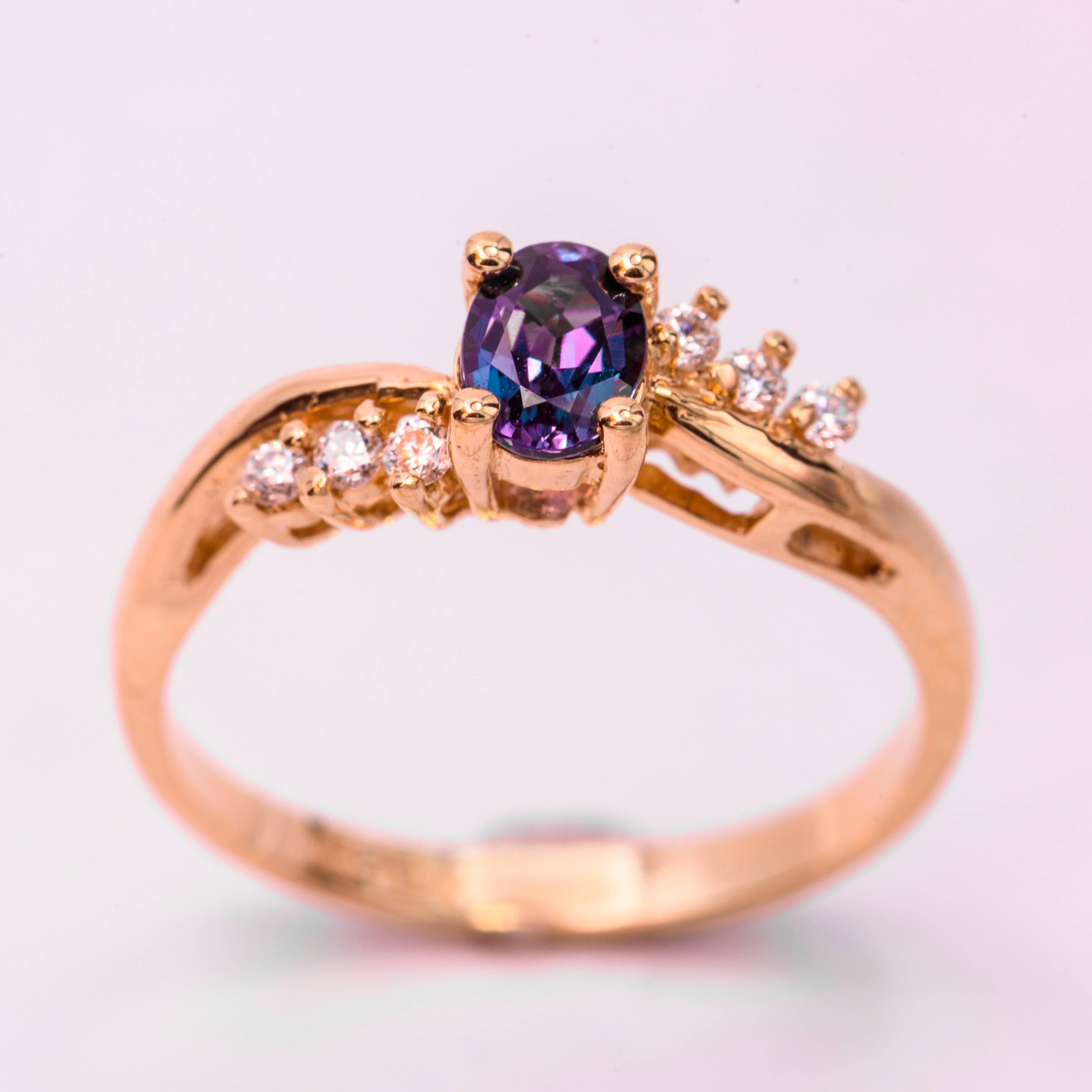 18 Karat  Yellow Gold Color-Changing Alexandrite Ring with CC Certificate 
Oval Alexandrite 0.44 Ct.
Diamonds 0.09 cts.