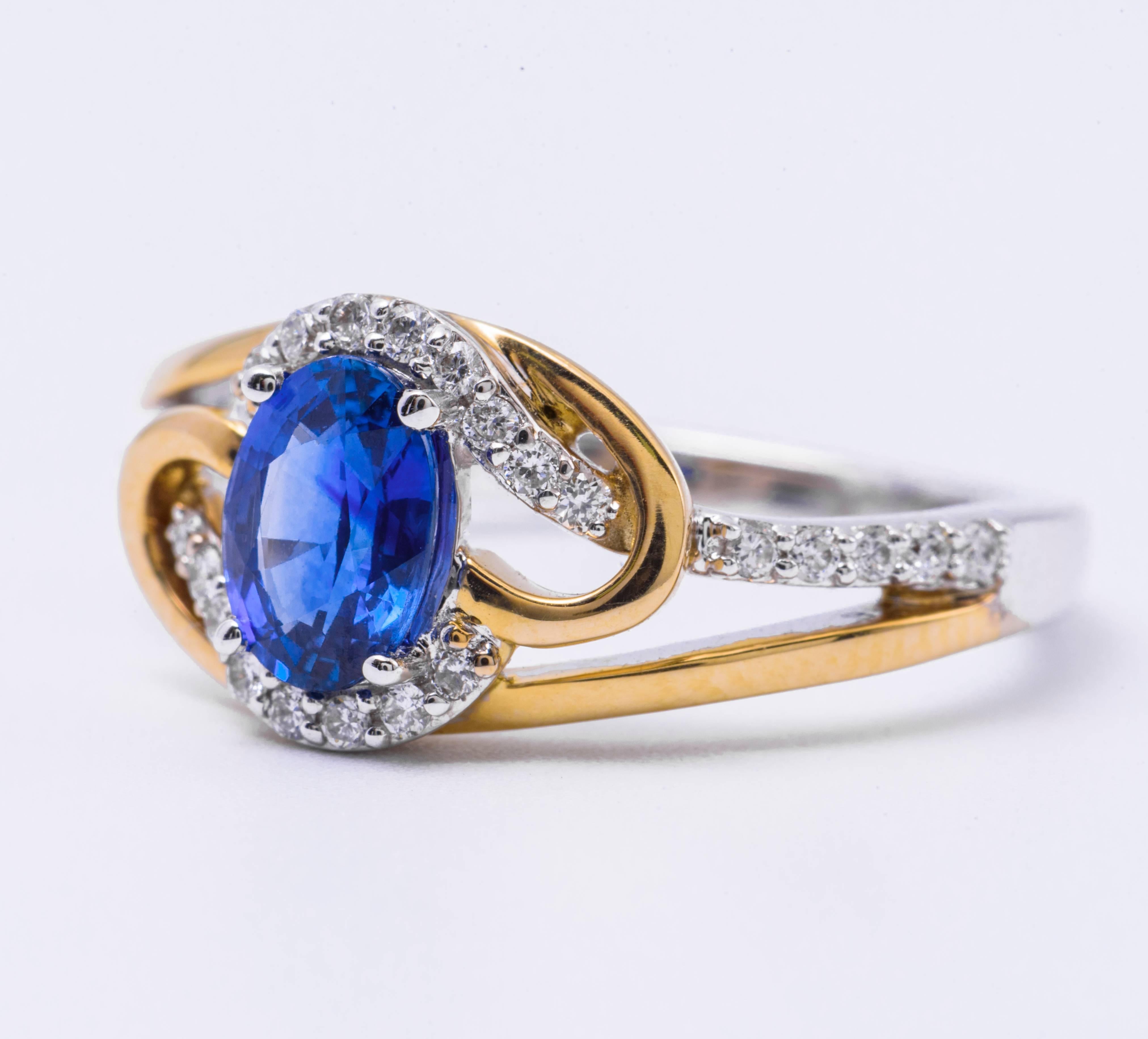 This beautiful ring features: Ceylon Sapphire 0.97 Carats 7x5 mm
14K white/yellow gold
Diamonds: 0.19 Carats