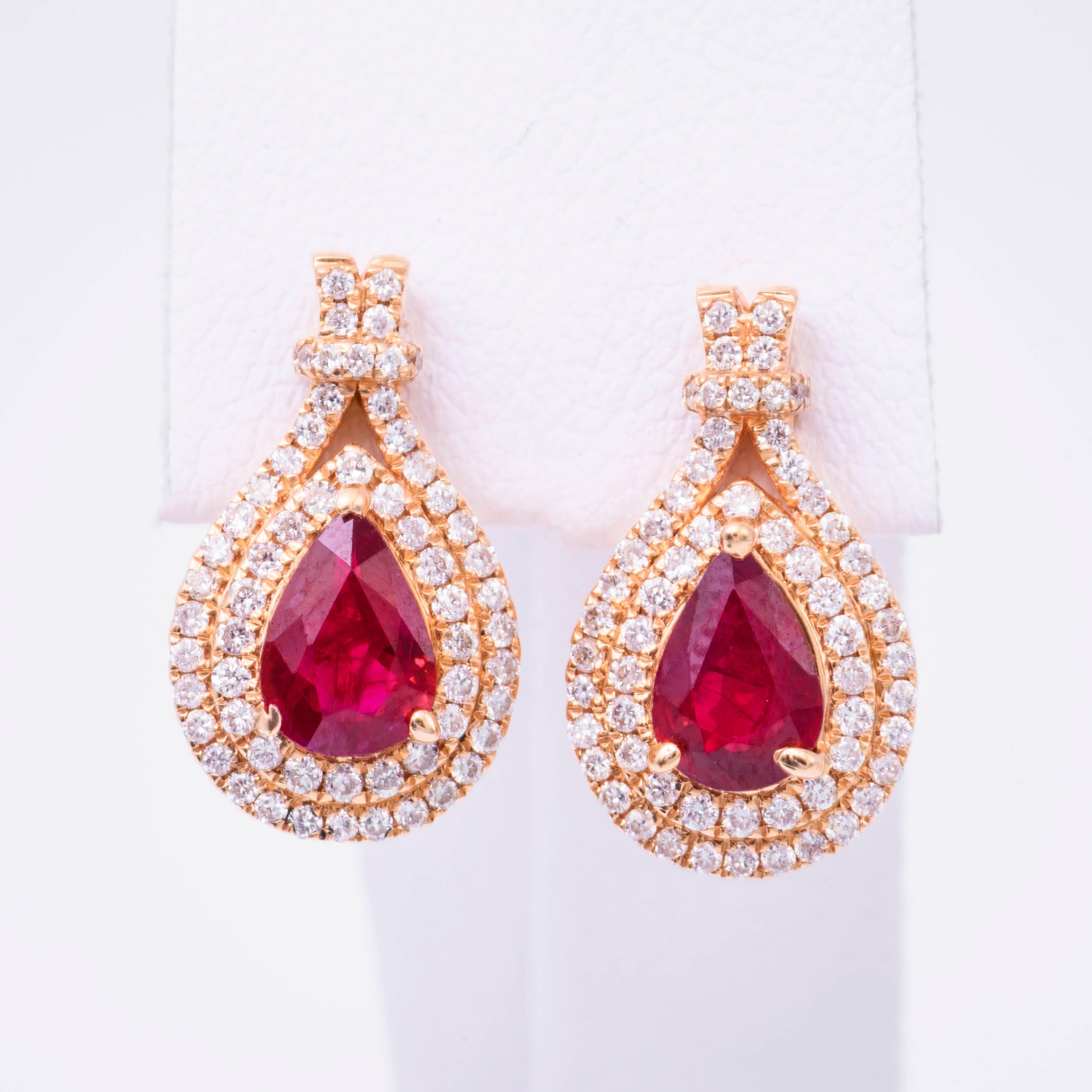 14K Rose Gold
Each ruby is 6 x 4 mm for a total weight of 1.84 Cts
Diamonds: 0.54 Cts
The earrings measures 16.5 mm x 10 mm