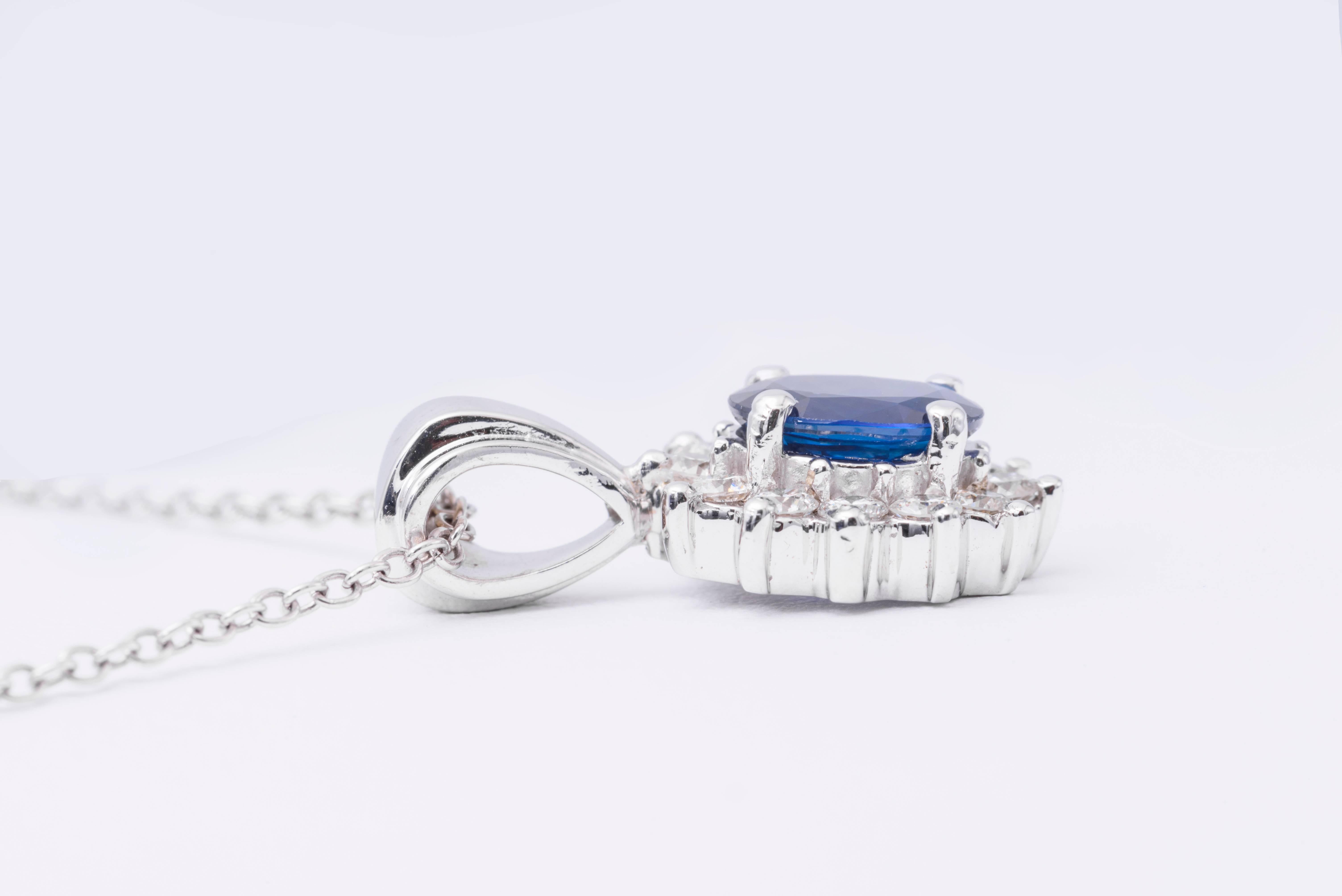 14K white gold with sapphire measuring 9 mm x 7 mm and weights 1.89 cts.
Diamonds: 0.70 cts.
pendant measures 24 x 13 mm