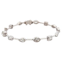 6.62 Carat Multi Shape Diamond Bezel-Set Tennis Bracelet in 18K White Gold