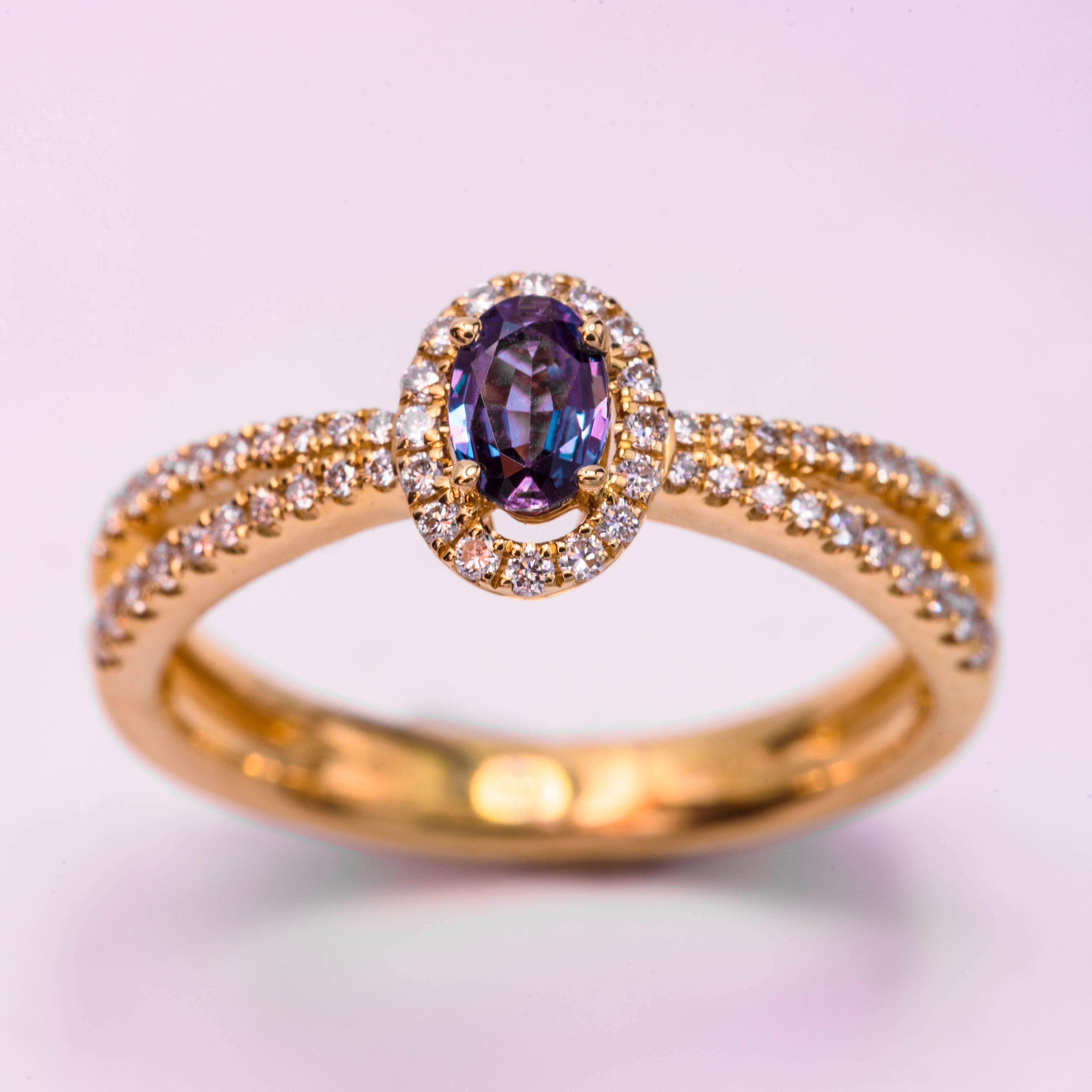 Contemporary Oval Alexandrite and Diamond Ring with 18 Karat Yellow Gold