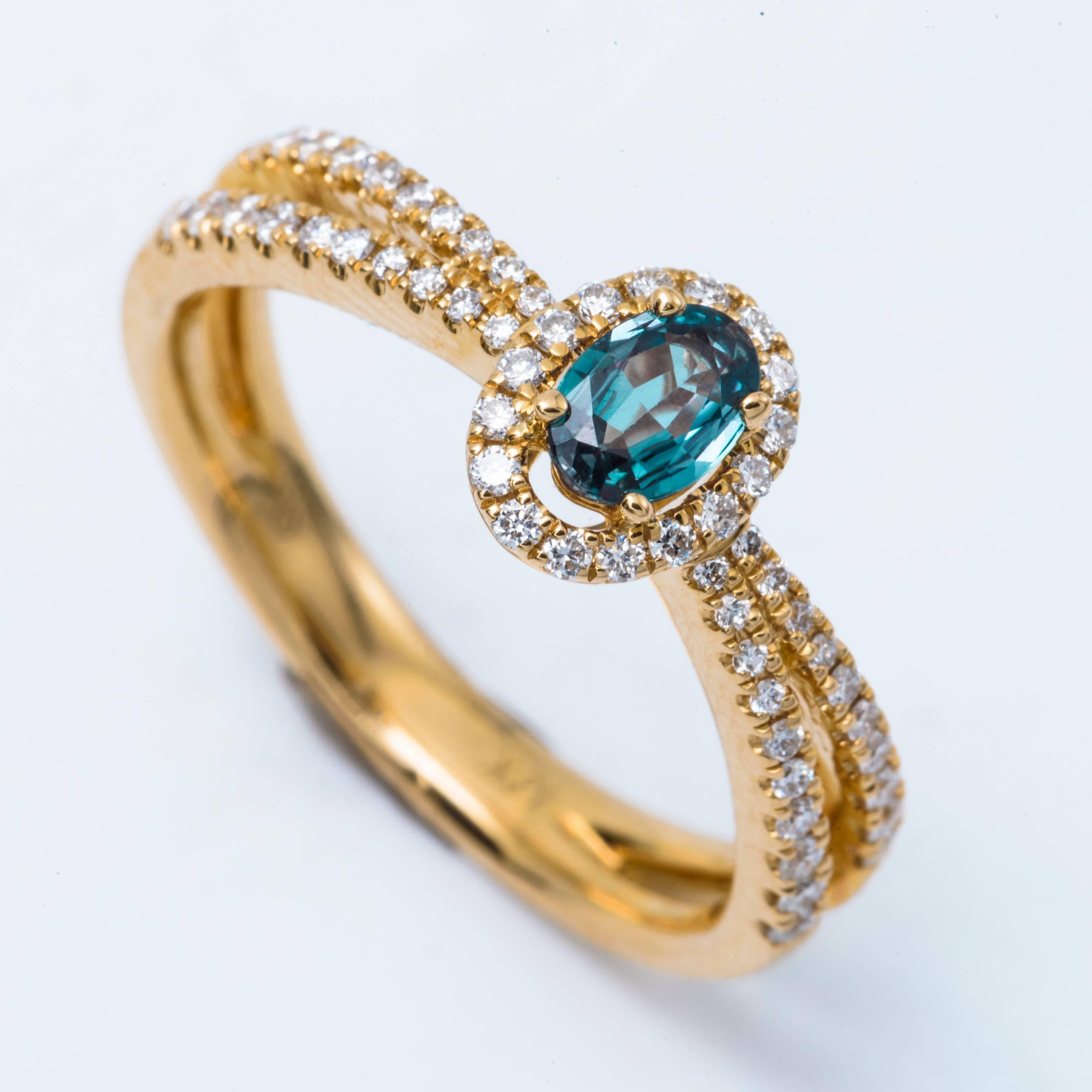 Oval Cut Oval Alexandrite and Diamond Ring with 18 Karat Yellow Gold