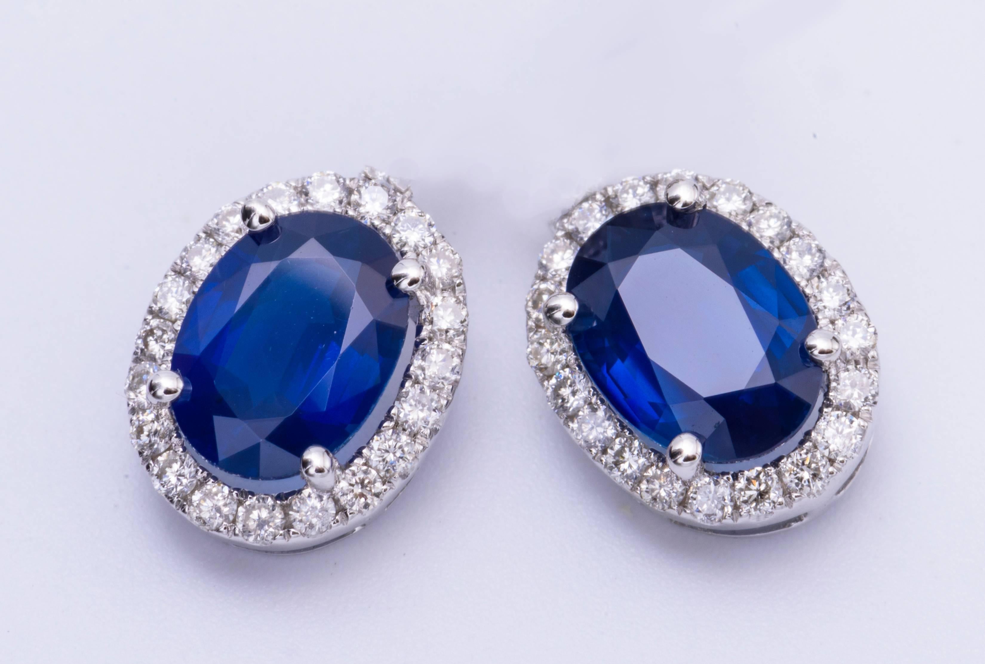 14K White gold
6 x 4 sapphire 1.24 Cts.
Diamonds 0.17
Earrings measures 9 x 7 mm