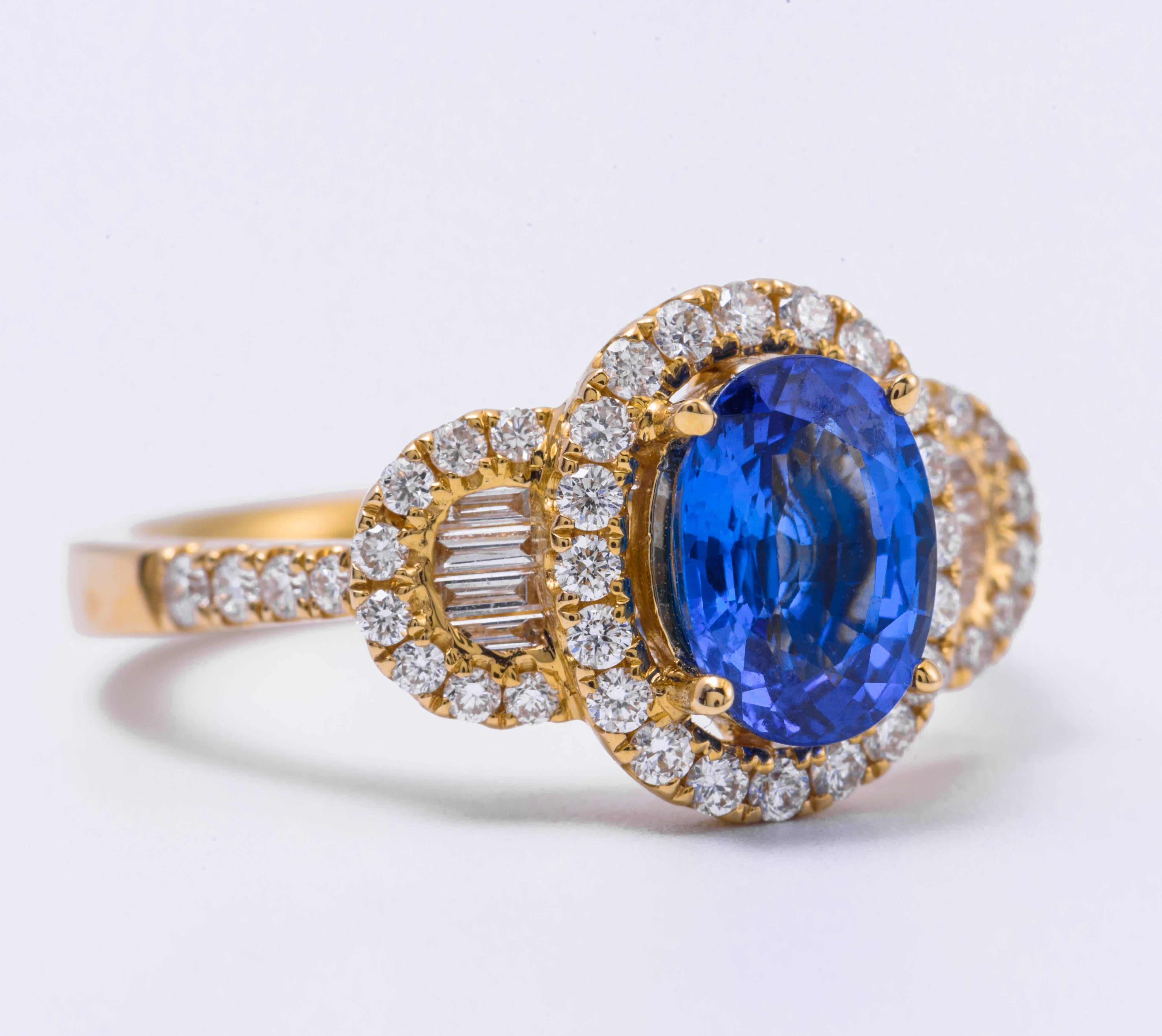 Style:  Oval Shape Ceylon Sapphire and Diamond Halo Engagement Ring
Material: 14 k Yellow Gold
Gemstone Details: 1 Oval Shape Ceylon Sapphire approximately 1.80 ct. 8x6 mm
Diamond Details: Approximately 0.58 ctw of diamonds. Diamonds are G/H in