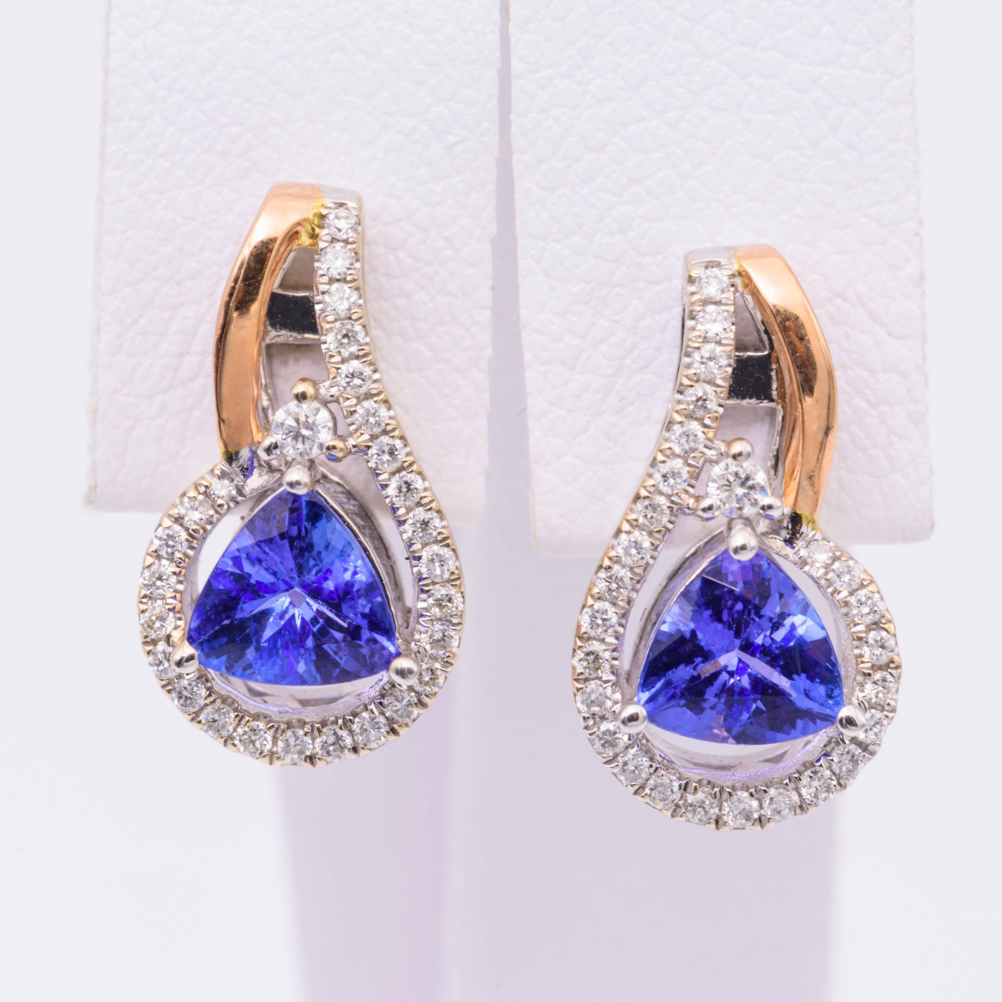 Each Tanzanite measures 5 mm for a total weight of 1.22 Carats
Diamonds: 0.24 Carats
Earrings measures 15 X 9 mm
14K white and rose gold