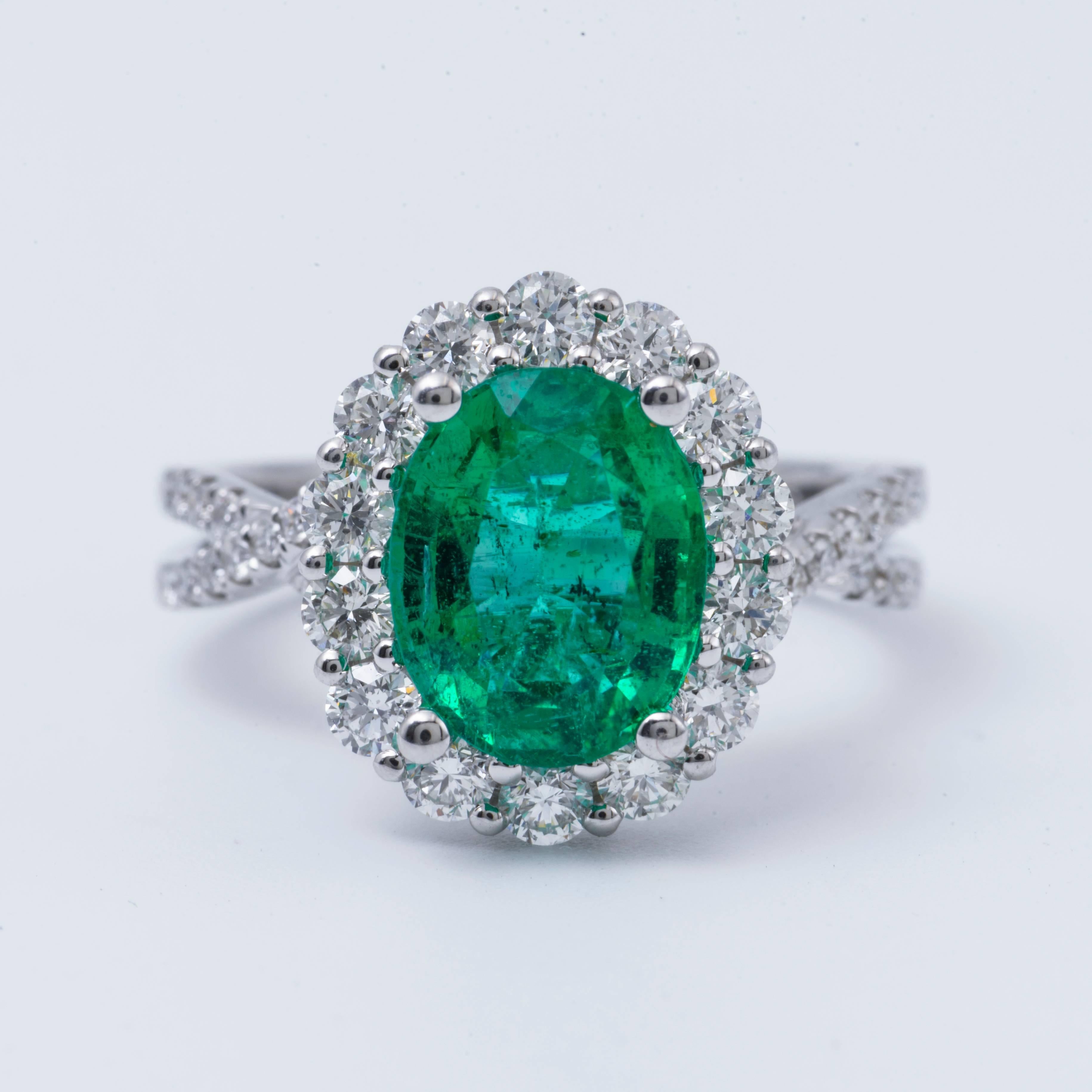 Contemporary Emerald Diamond Halo Ring 18 Karat White Gold