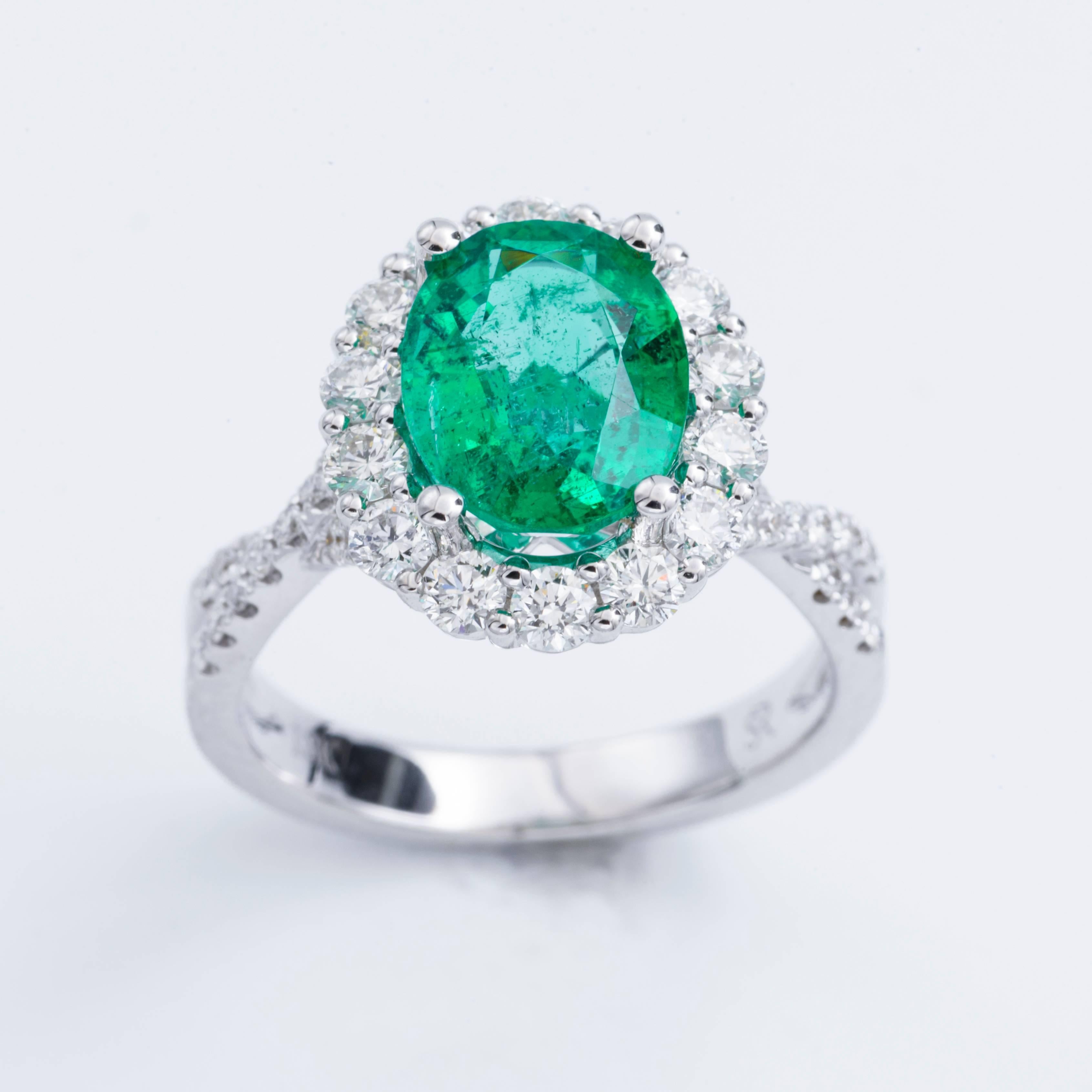 Emerald Diamond Halo Ring 18 Karat White Gold In New Condition In New York, NY