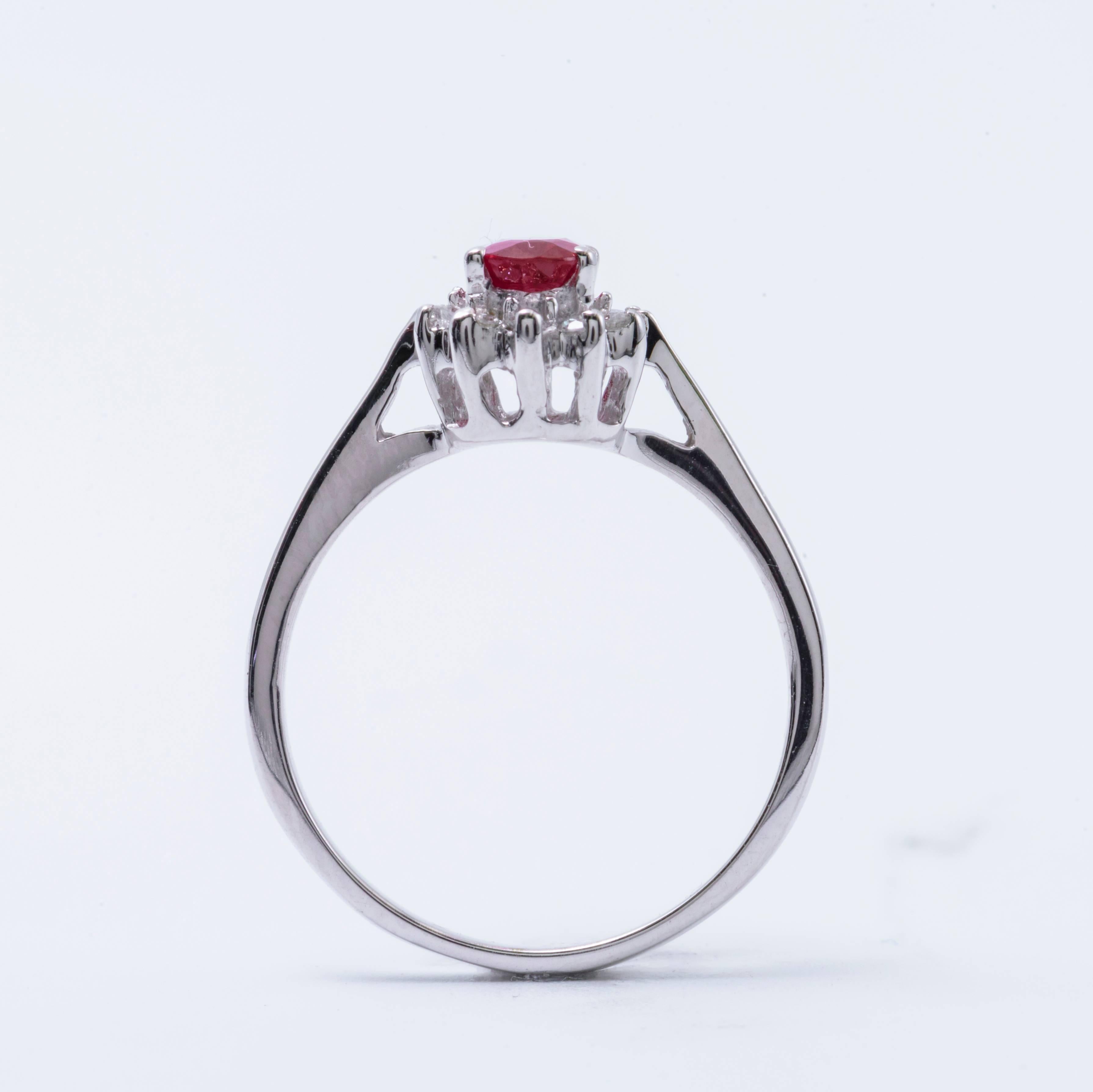 Contemporary Oval Ruby and Diamonds Halo Ring