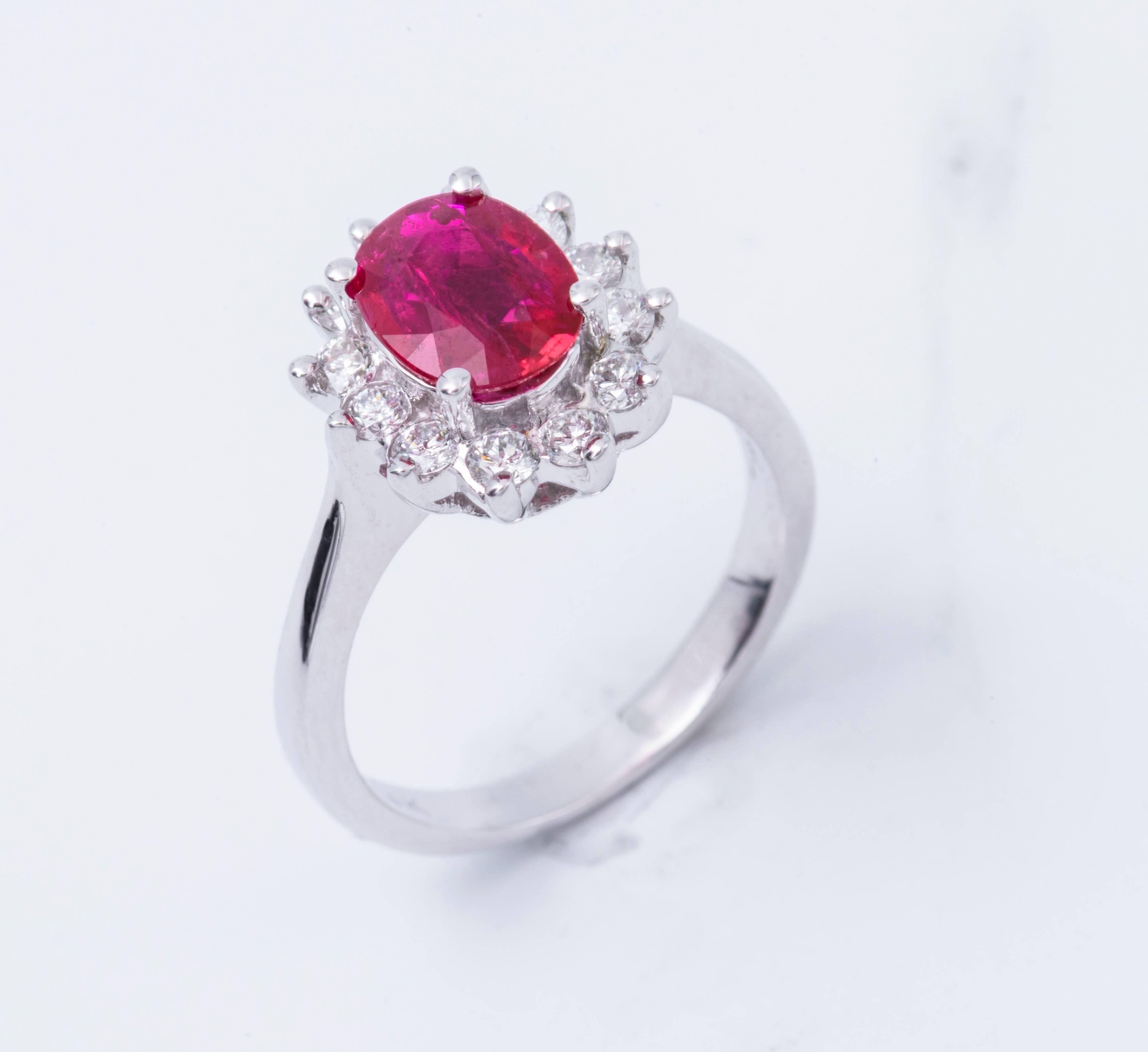 Oval Ruby and Diamonds Halo Ring In New Condition In New York, NY