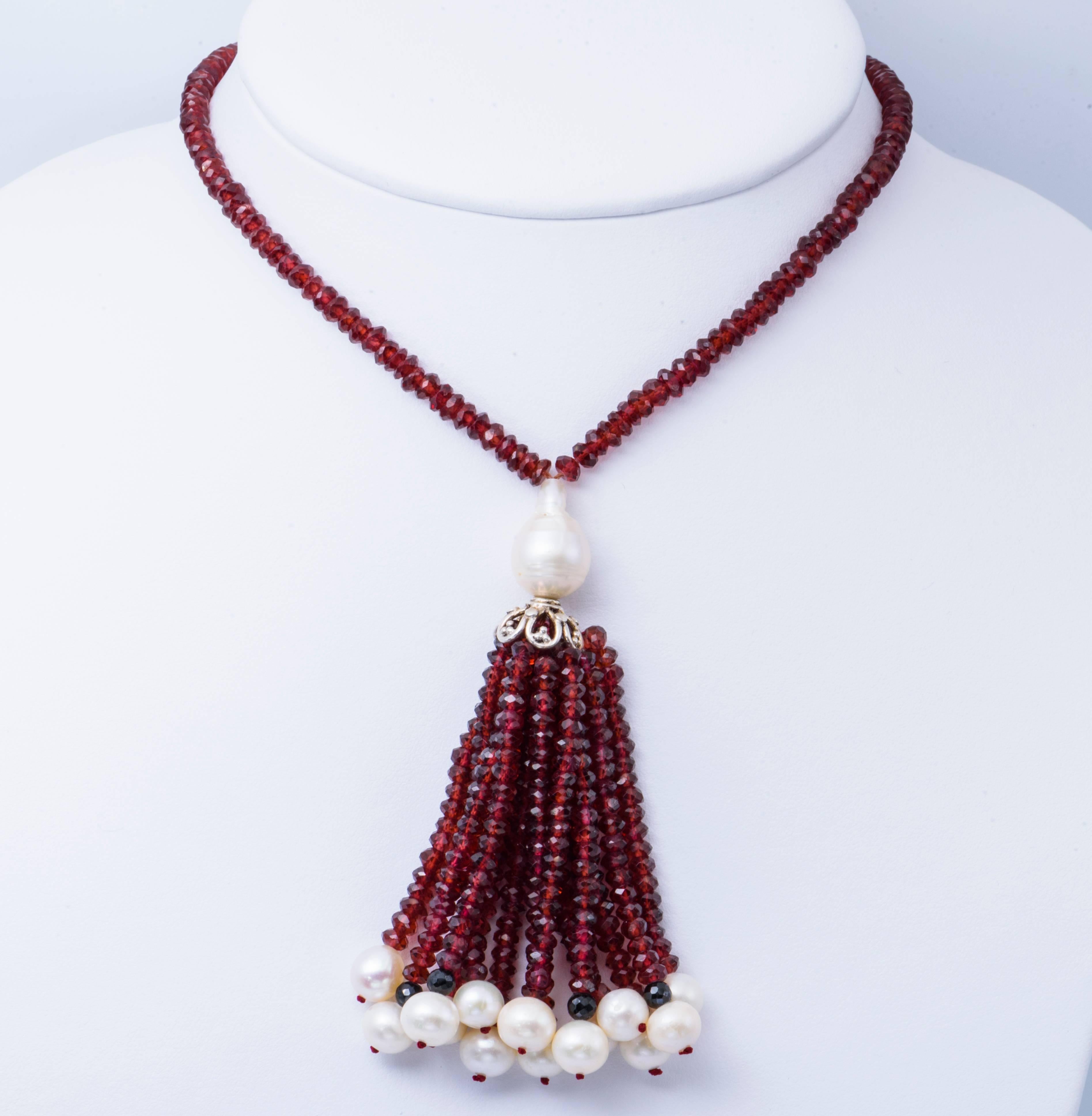 Tassel Garnet and Fresh Water pearl 40" long with accent of black spinel 
15 mm Silver Cup  
Because of the nature of the pearls, each one comes in different shades and luster and  natural blemishes on the pearls.
Pearl Quality : A
Pearl