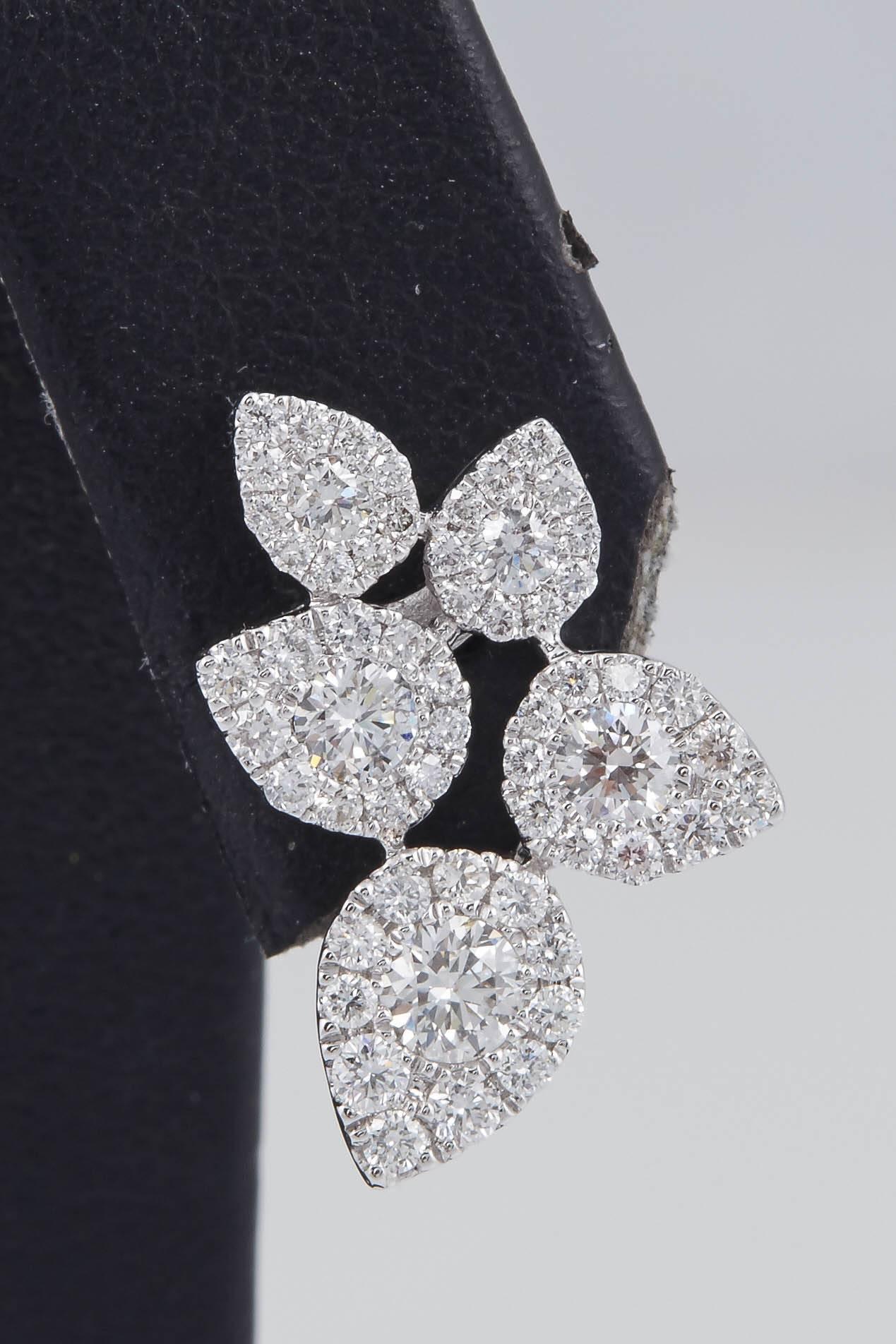 18K White Gold 
10 Rounds 0.65 Carats
106 Rounds Diamonds 0.63 cts.