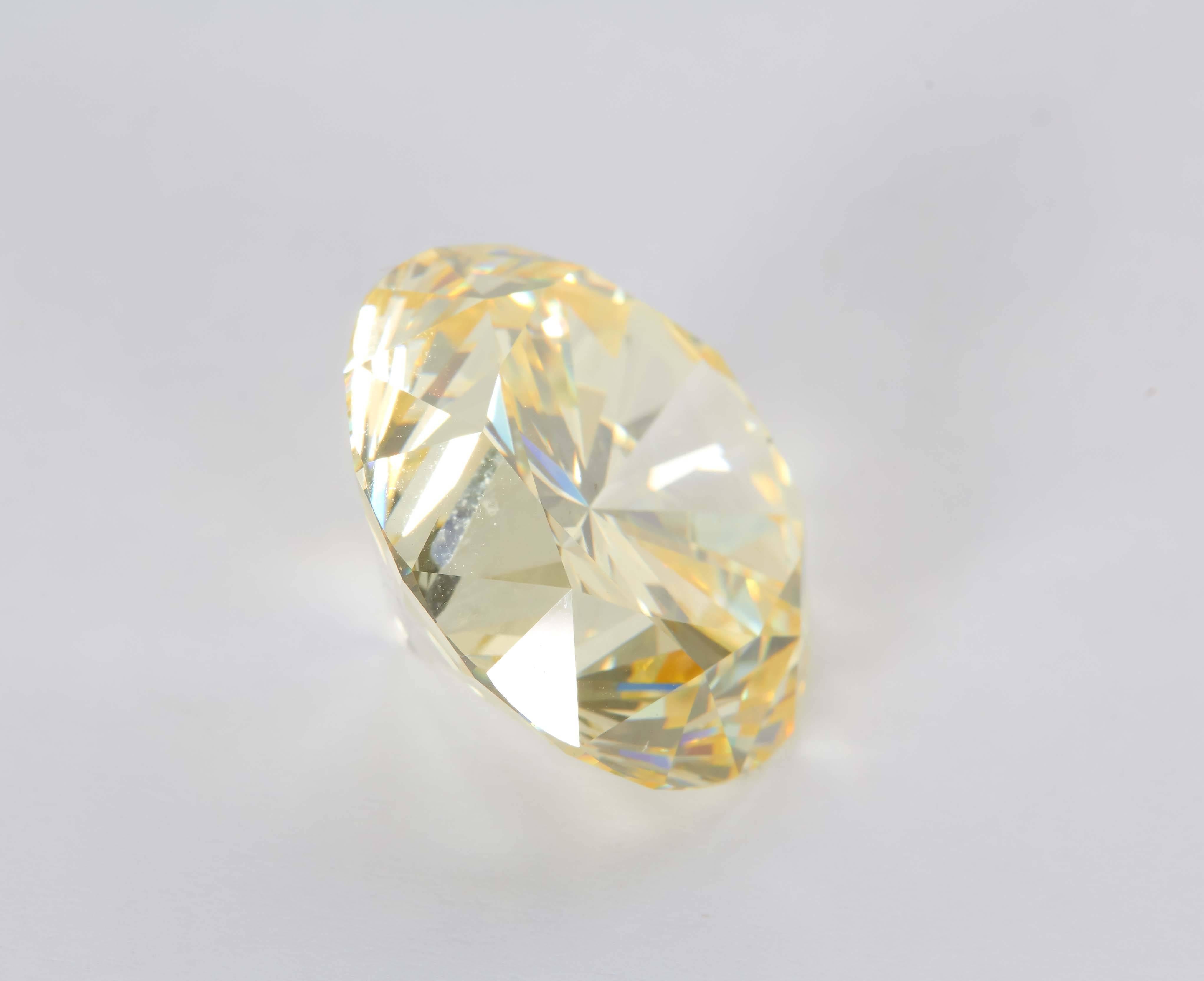 Contemporary Natural Fancy Intense Yellow Diamond 22.77 Carat Platinum Ring For Sale