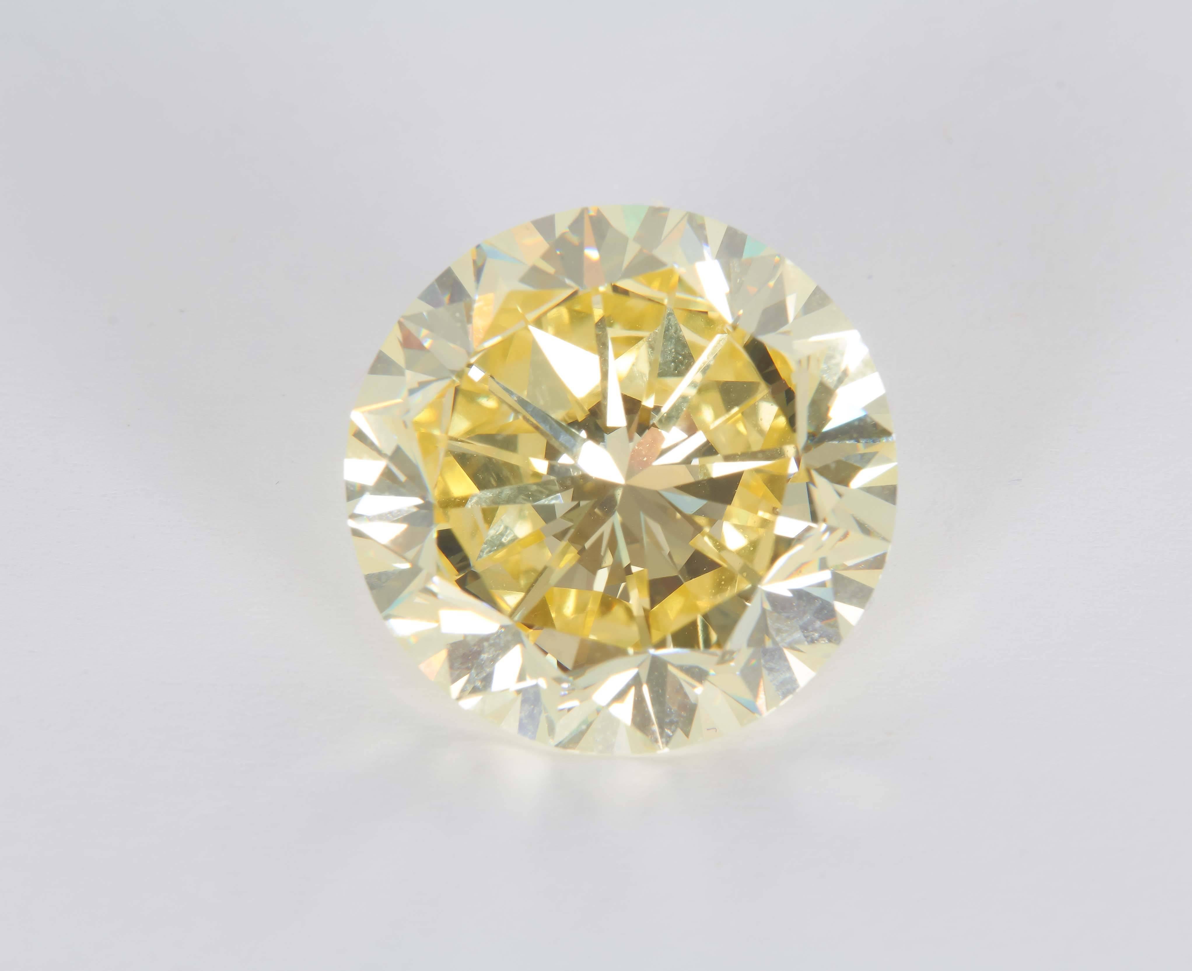 Natural Fancy Intense Yellow Diamond 22.77 Carat Platinum Ring In New Condition For Sale In New York, NY