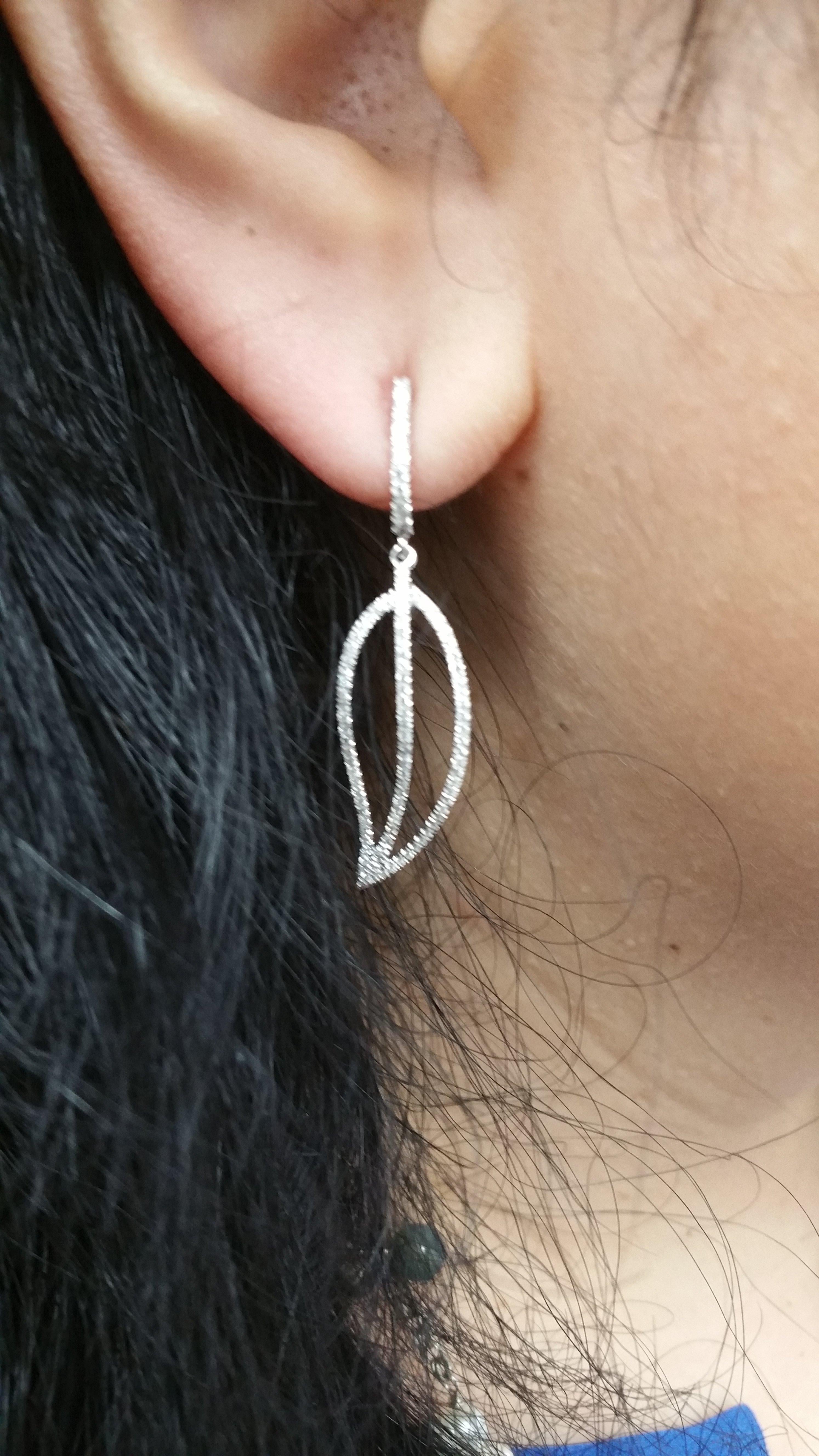 Beautiful Earrings featuring:
18k white gold
0.60 total cts. weights
metal weights: 3.6 grams
diamond shape: rounds
diamond counts: 188
diamond clarity : SI1
diamond color: G+
the earrings are 0.5 