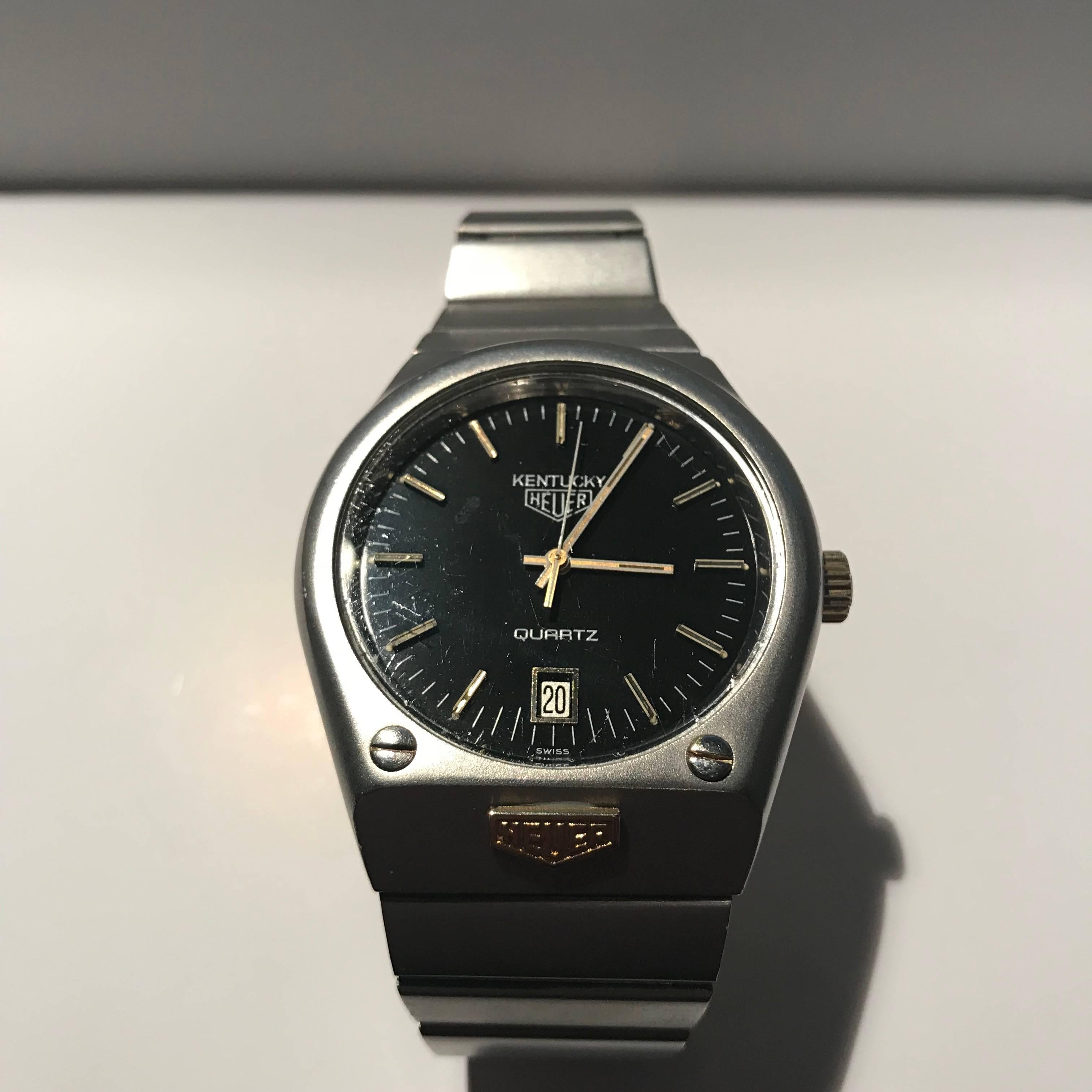 Beautiful and rare Heuer Kentucky
steel/bracelet steel/steel
black dial
date at 6 o' clock
black dial
quartz
Heuer coat of arms on bracelet
rare watch from the Heuer period (pre Tag Heuer)
excellent condition
1 year warranty
Sending neatly