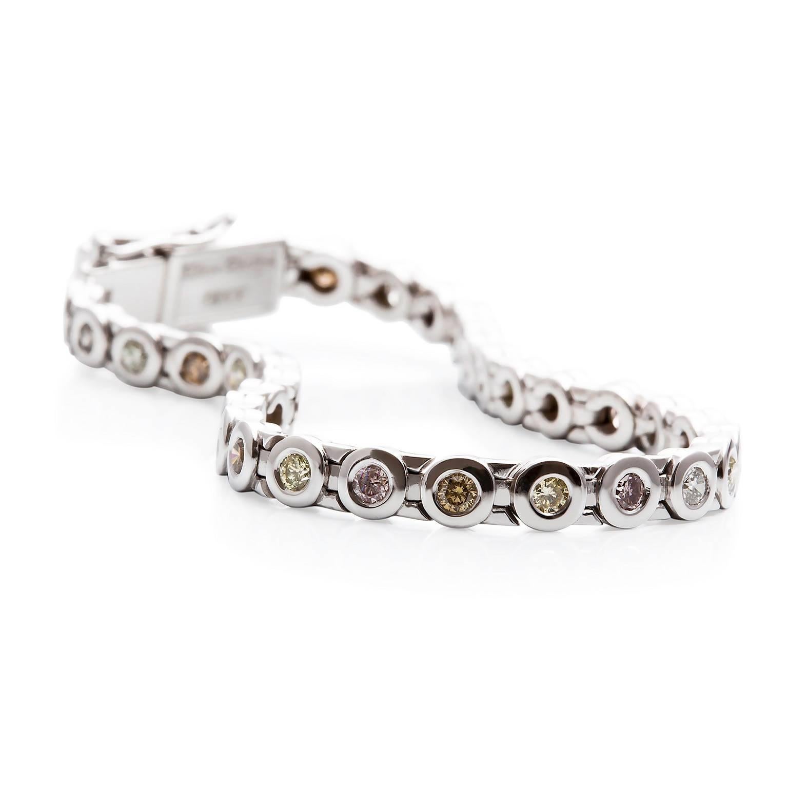 Festivo Diamond Tennis Bracelet

The stunning 18ct white gold tennis bracelet is set with 35 chenier set diamonds and is completed with an ultra safe box clasp. A twist on a classic!

Round brilliant cut diamonds: 35 = 2.12ct total weight, Multiple