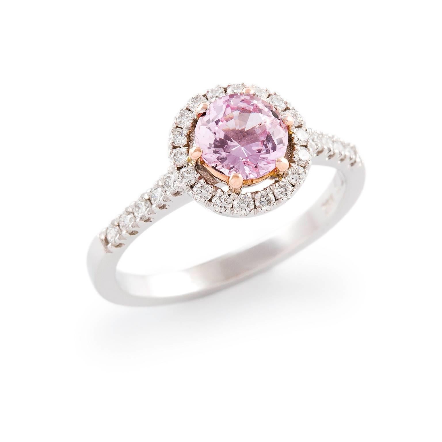 Rosa Zaffiro Ring

This sweet dress ring in 18ct white and rose gold is set with a delightful pastel pink sapphire which is surrounded by a halo of petite diamonds that also extend to the shoulders of the elegant band.

Round faceted sapphire: pale