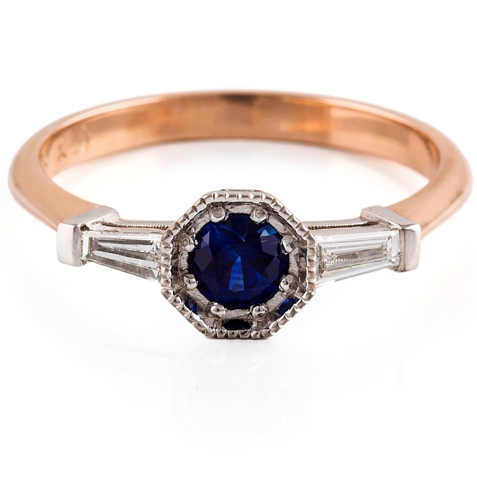 Art Deco Style Dark Zaffiro Ring

With timeless appeal, this elegant Art Deco Style ring is set with a stunning Ceylon Sapphire and tapered baguette diamonds. The white gold setting has lovely milgrain detailing and the band is made of rose gold.
