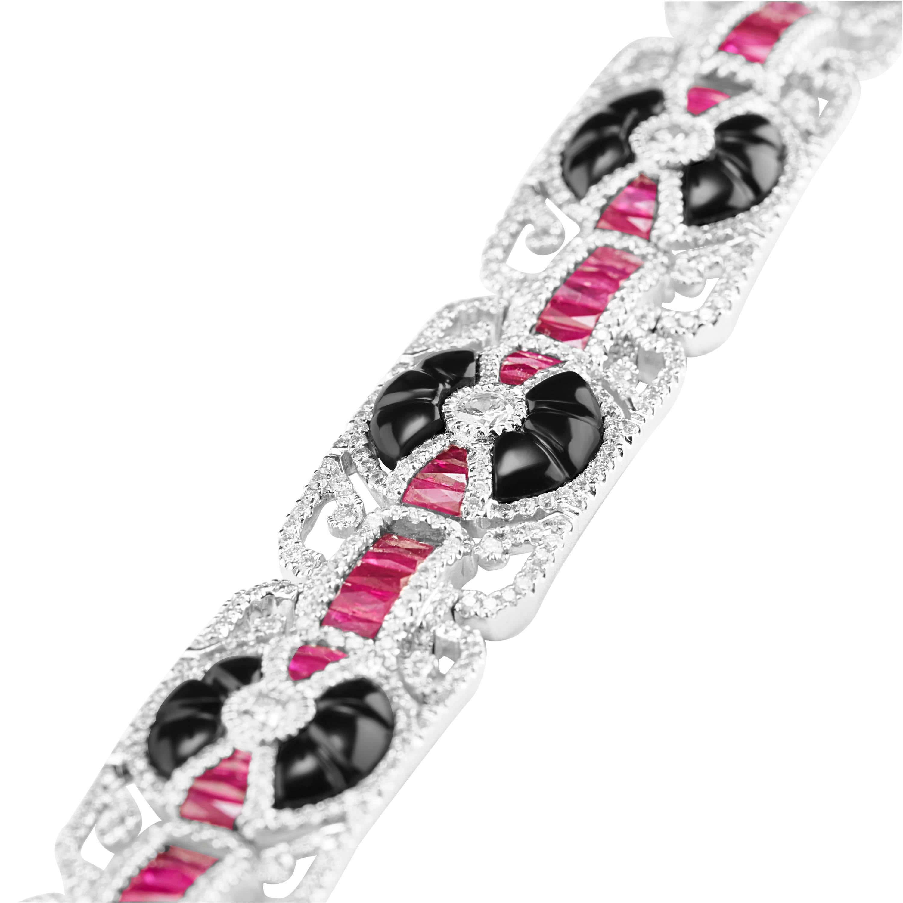 This solid 18 Carat White Gold Onyx Ruby and Diamond Bracelet.
Extremely beautifully made with so much passion and love and is our favourite pick.
Ruby weighs 8.47 Carats. 
Diamond weighs 5.36 Carats.
All stones are SI in clarity and are GH in