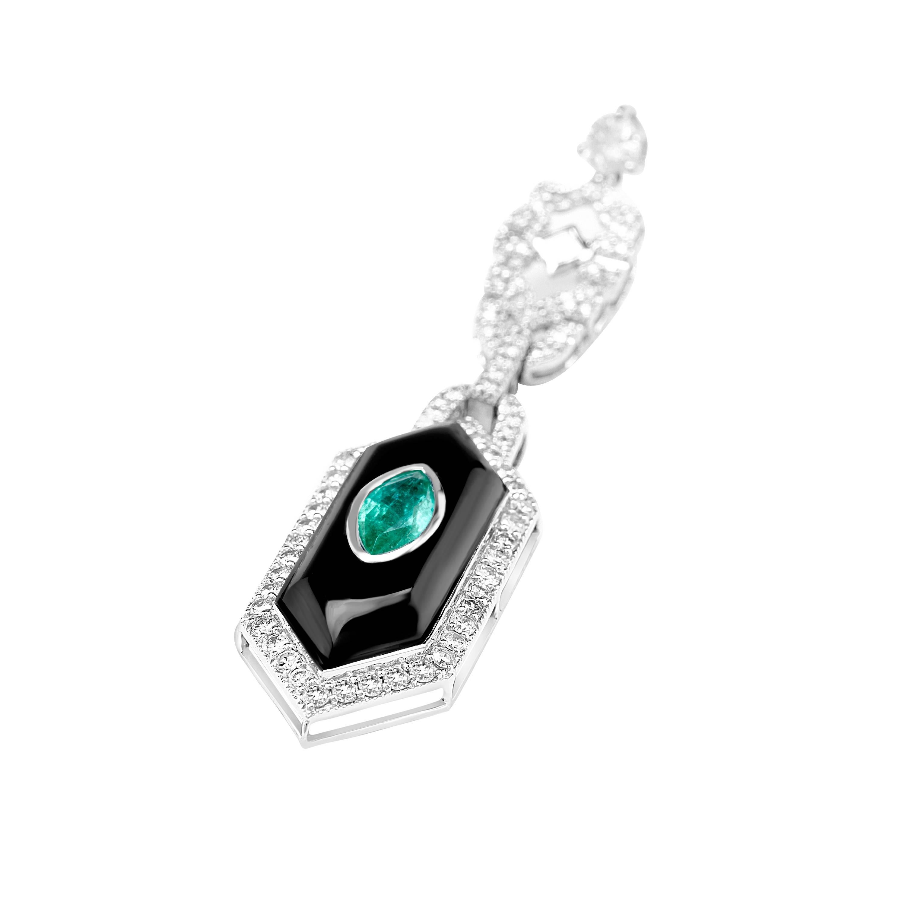 These pair of Diamond,Emerald And onyx Earrings Are a Must have.
They are elegant and classy. The  Marquise emerald cut emeralds are bezel set surrounded by onyx and diamonds which makes them stunning. When you see these it will be love at first