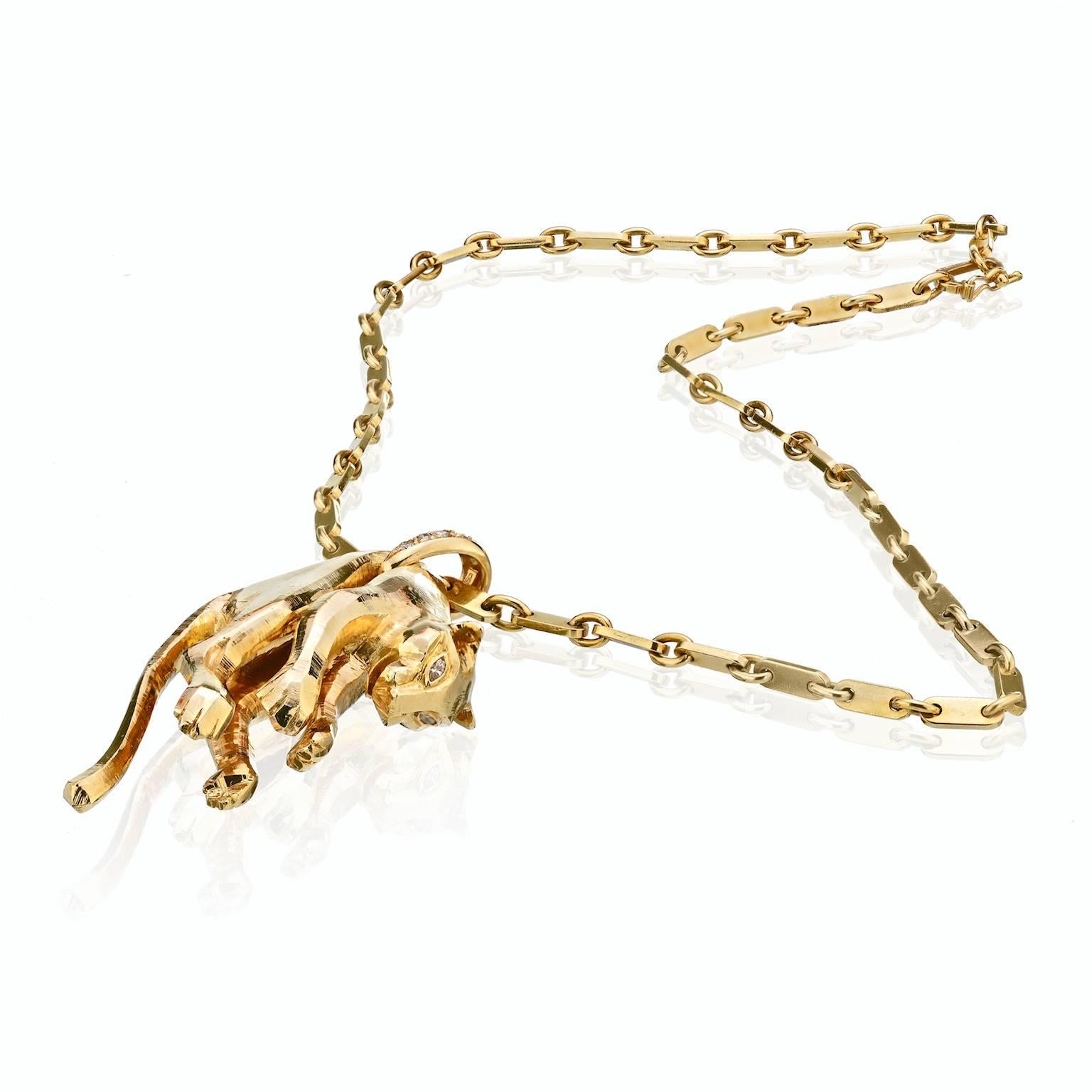 Cartier Panthère Hanging Panther Pendant, Accented by Marquise Cut Diamond Eyes and Brilliant Cut Diamond Bail.
Cartier 18K Yellow Gold Chain 14 1/2 inches 