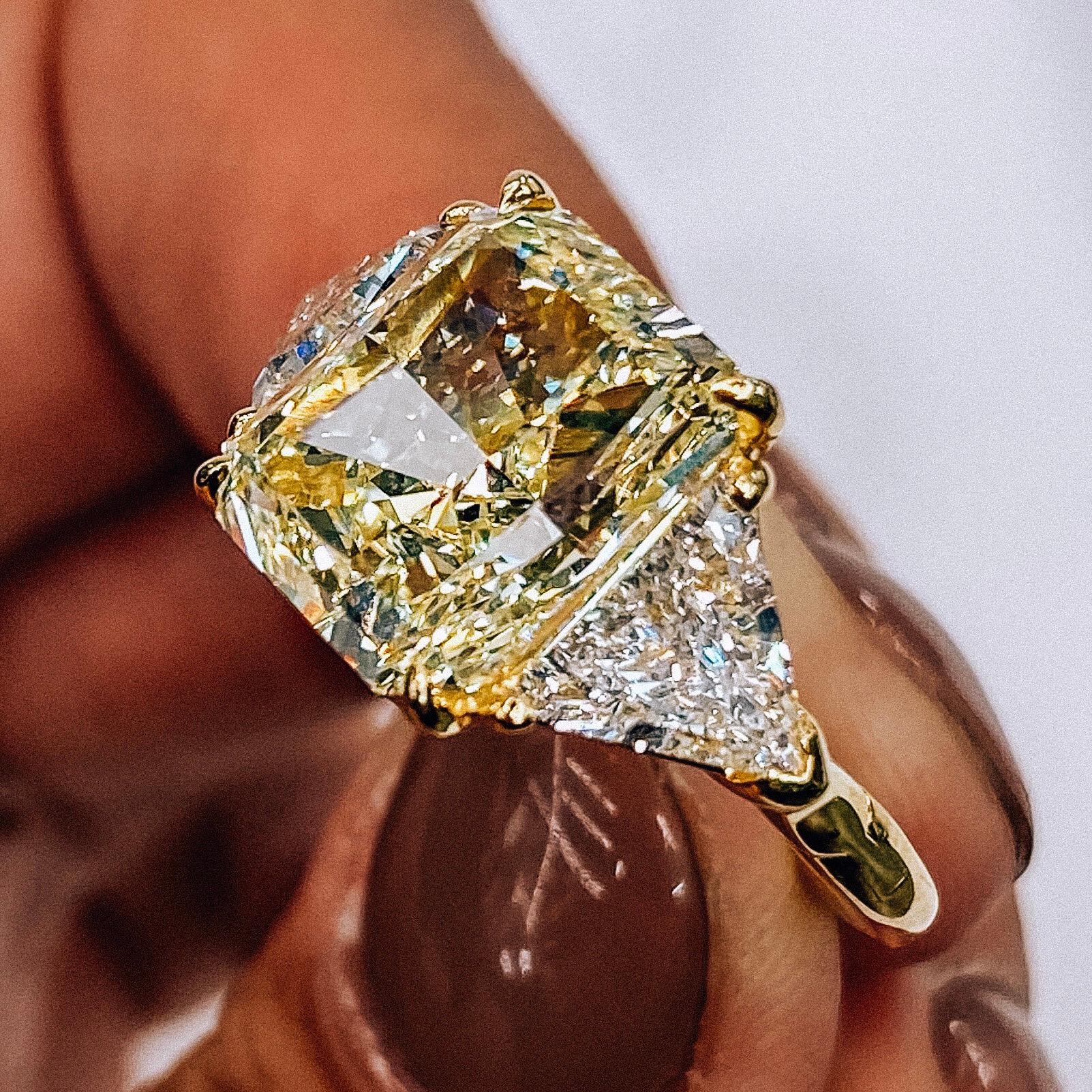Modern 6.76 Carat Radiant Cut Fancy Yellow VVS2 Diamond Three-Stone Engagement Ring