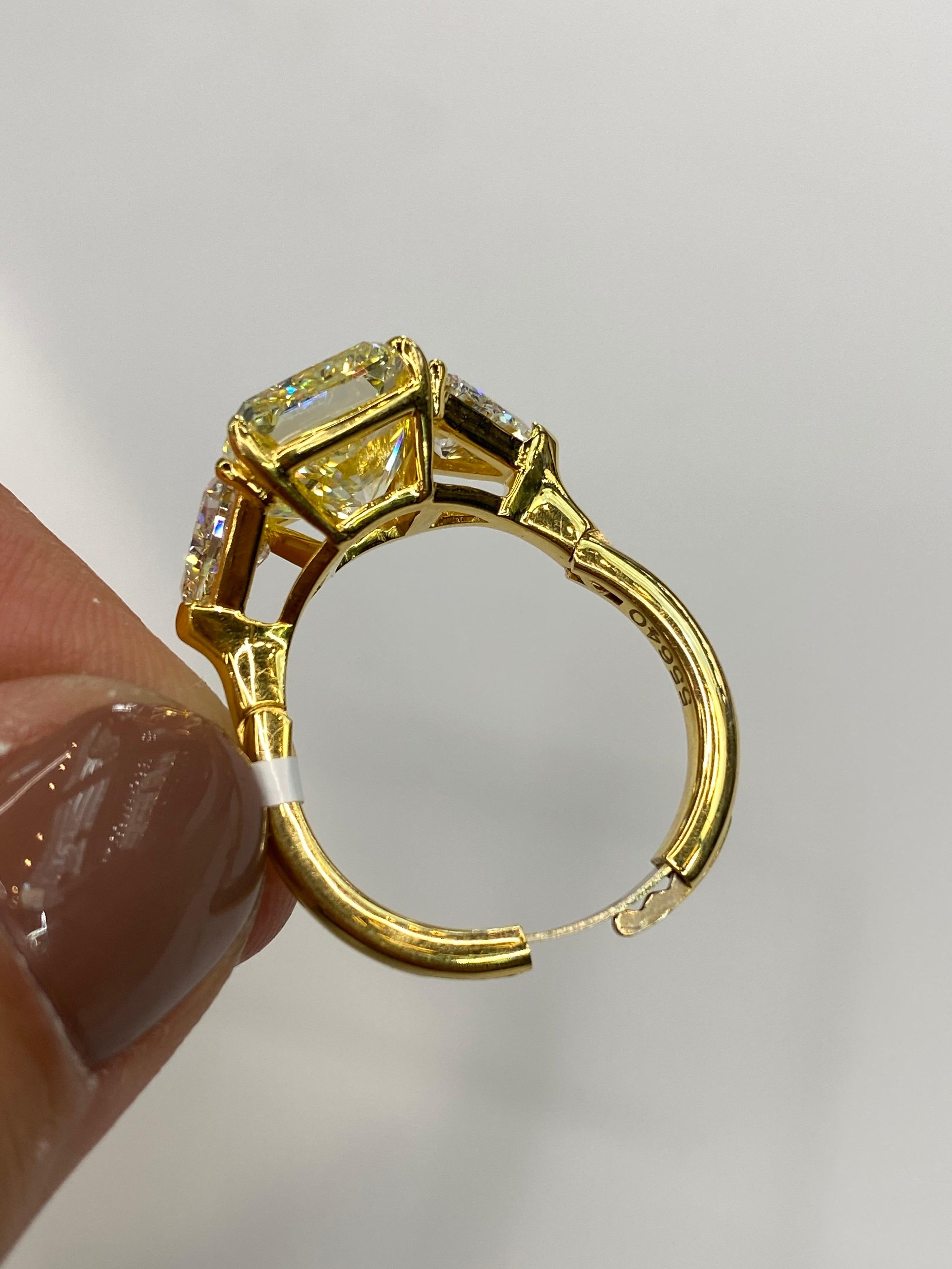 6.76 Carat Radiant Cut Fancy Yellow VVS2 Diamond Three-Stone Engagement Ring In New Condition In New York, NY