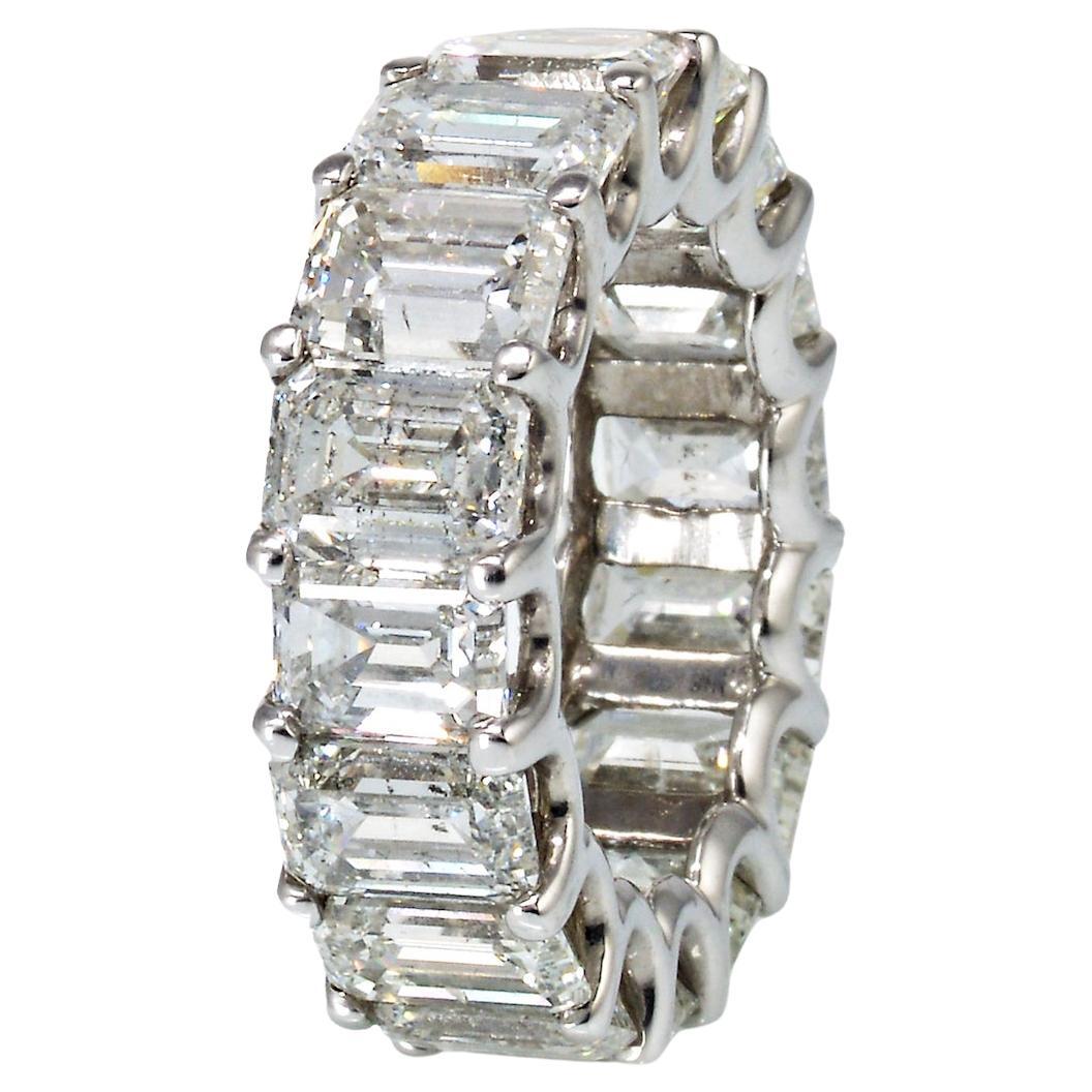 A stunning celebration of your commitment, this fancy-shaped diamond eternity band is a confident choice for your loved one. 

Desired for their rarity and precision, Emerald-cut diamonds deliver a stunning look. Each diamond is over 1 carat in