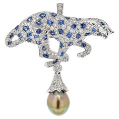 Ciondolo/spilla a forma di pantera con perle grigie di Tahiti, zaffiri e diamanti Cartier