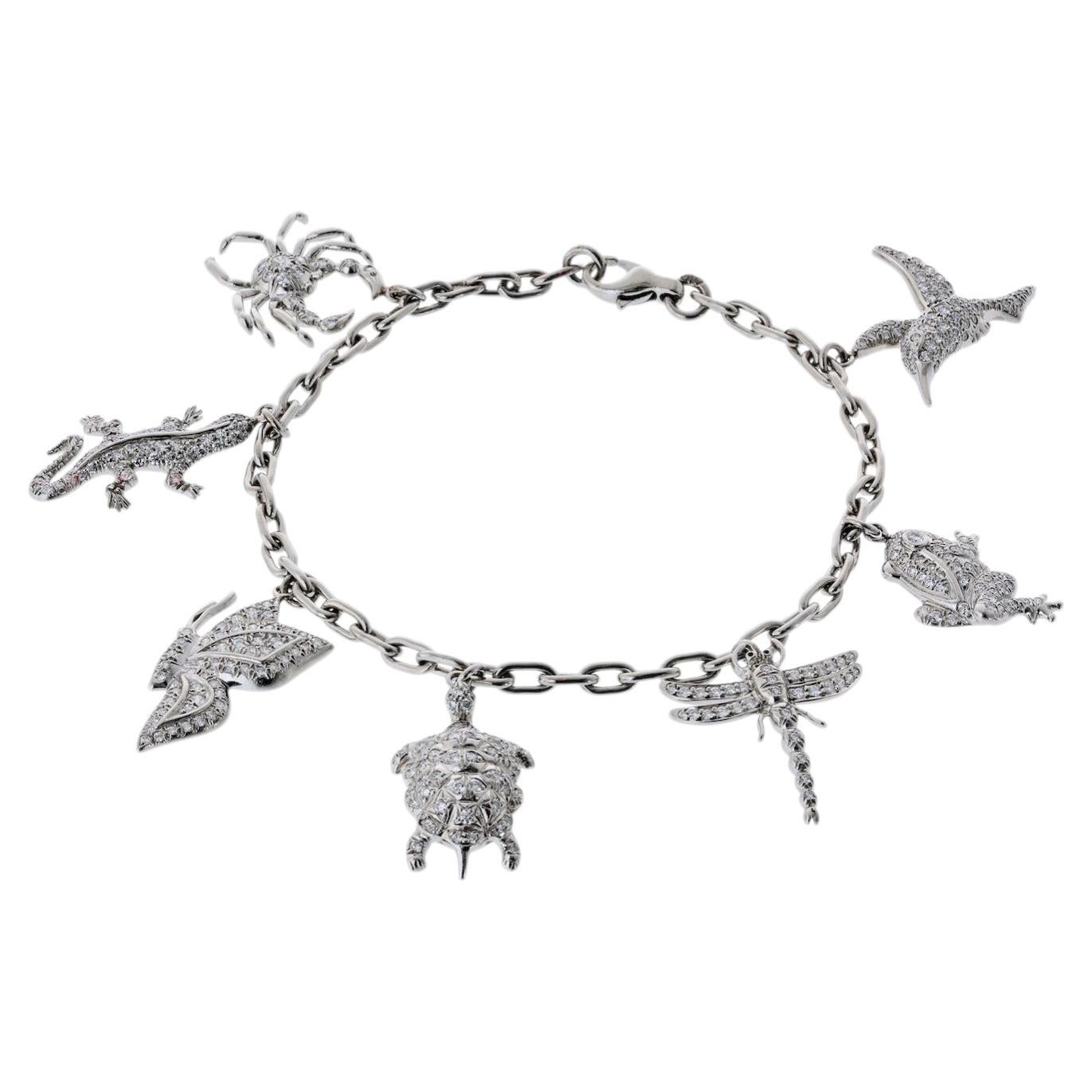 Tiffany & Co. Platinum 7 Charm Diamond Bracelet For Sale