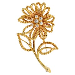 Tiffany & Co. Brosche in Form einer Blume aus 18-karätigem Gelbgold mit Diamanten