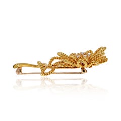Tiffany & Co. Brosche in Form einer Blume aus 18-karätigem Gelbgold mit Diamanten