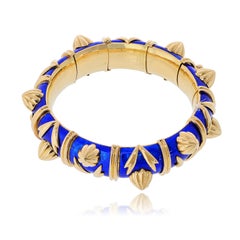 Tiffany & Co. Schlumberger Armband aus 18 Karat Gelbgold mit Paillonne-Verzierung und blauen Emaille-Kegeln