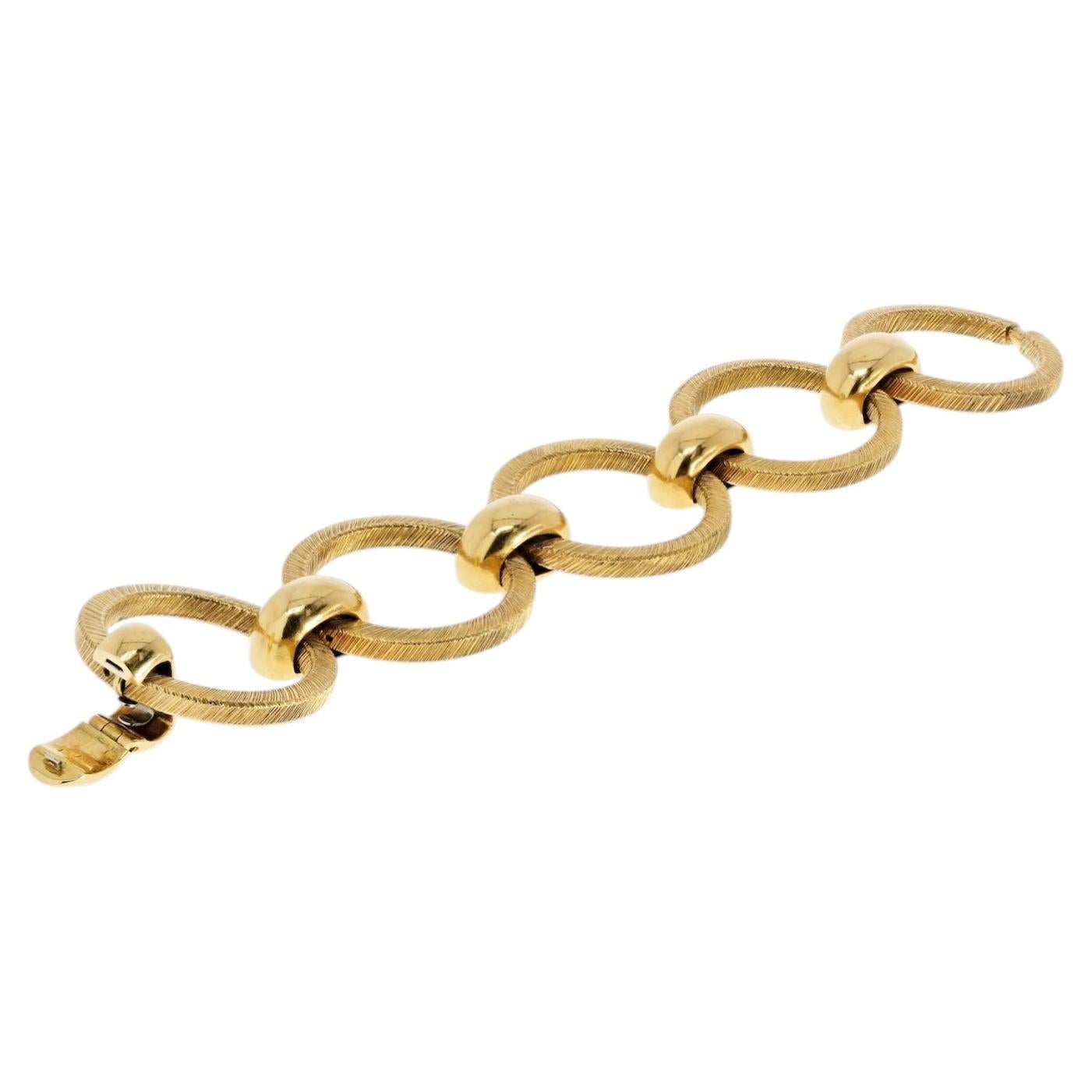 Bracelet Tiffany & Co. en or jaune 18 carats, création de Georges L'enfant des années 1970, fabriqué en France