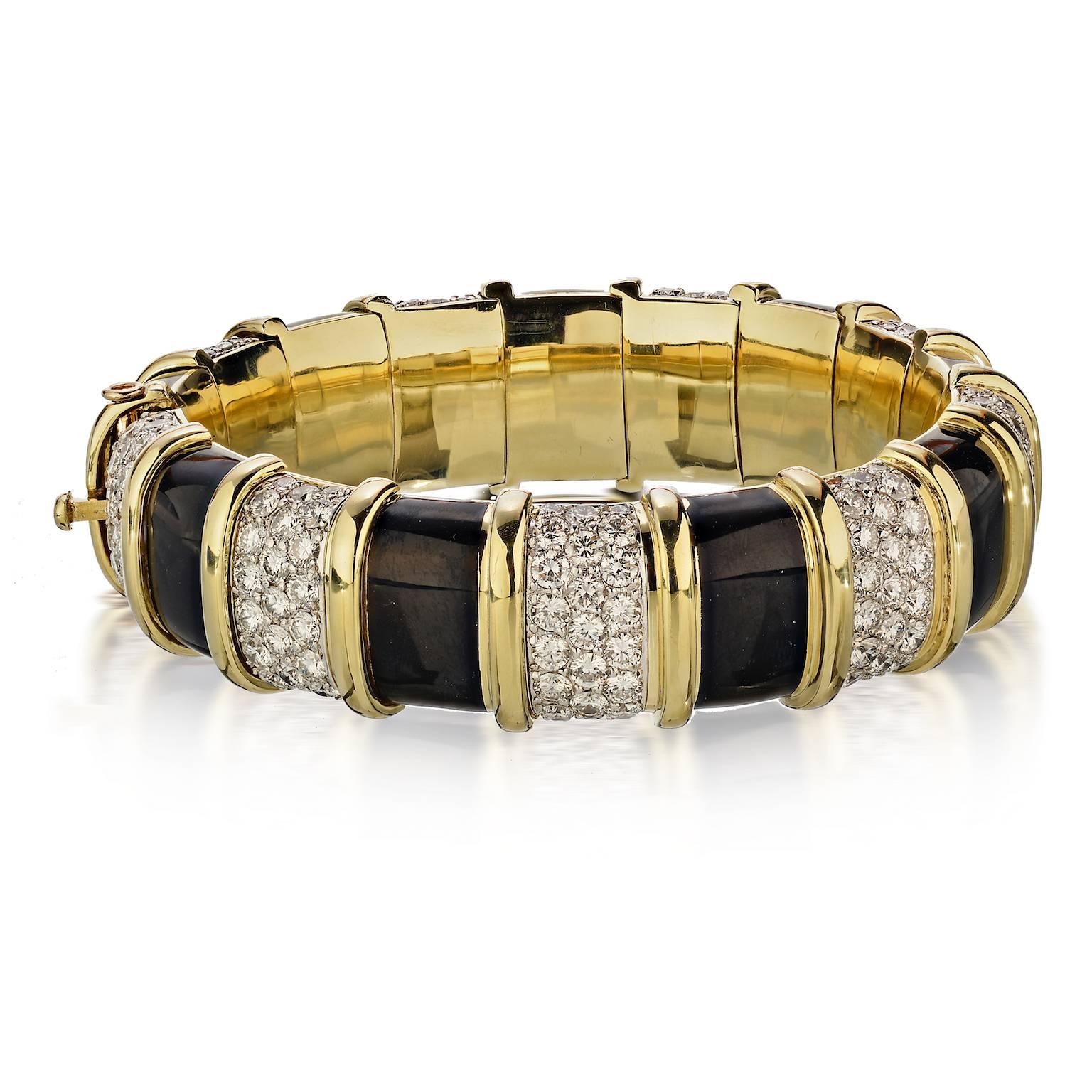 Tiffany & Co. Schlumberger Black Enamel and Diamond Bangle Bracelet in Platinum, 18K Yellow Gold with 207 Diamonds Apron. 22 Ct. With Tiffany fitted box)