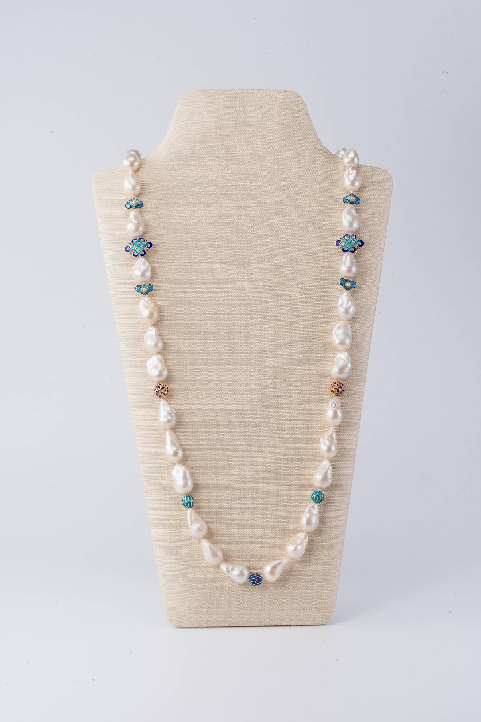 38 in (96.5cm) long necklace with baroque freshwater pearls

For those of us who love Chinoiserie and blue and white, the exuberantly baroque freshwater pearls are highlighted in a mix of cloisonné and vermeil beads, in the form of endless knots