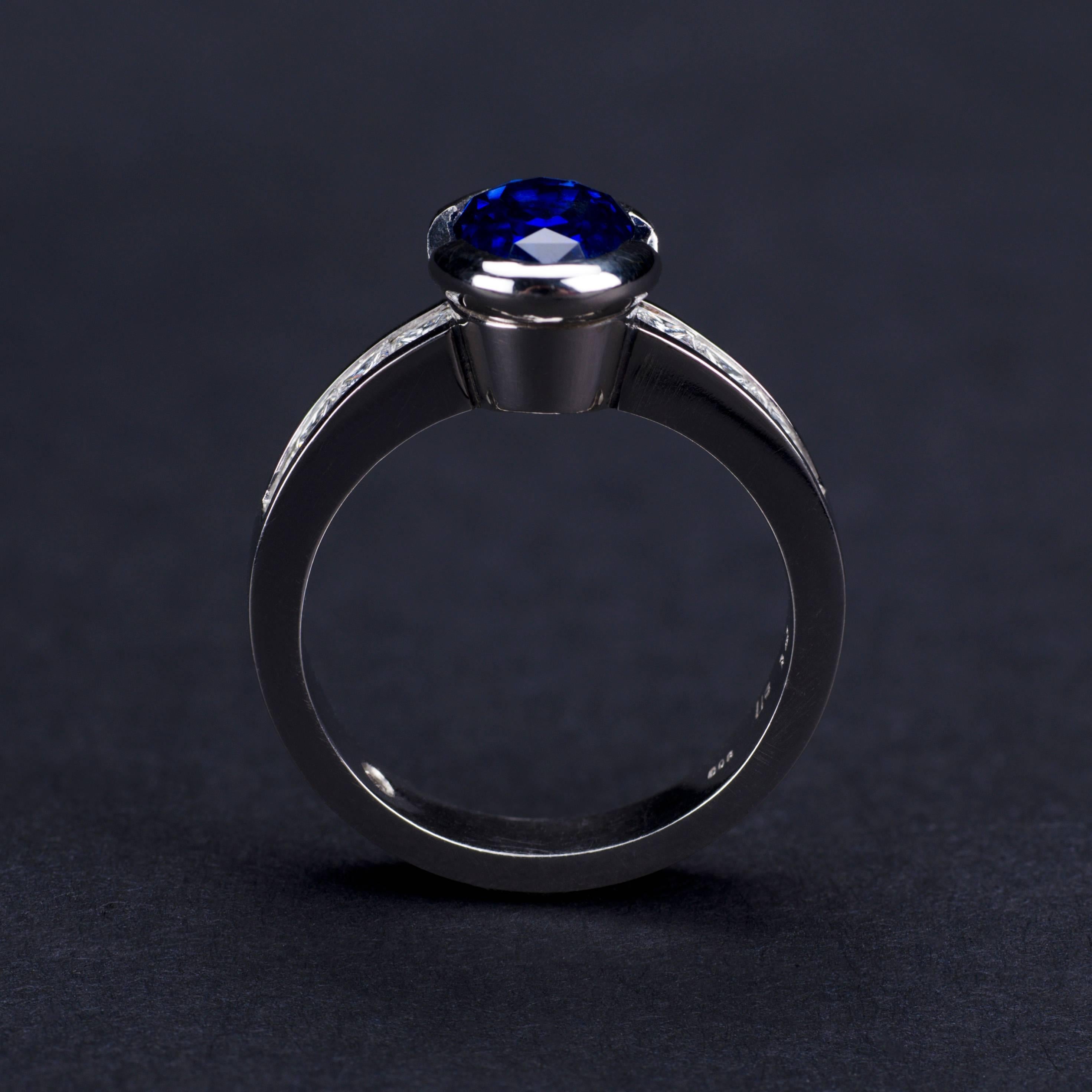 Contemporary Platinum Blue Sapphire Princess Cut Diamonds Engagement Ring For Sale