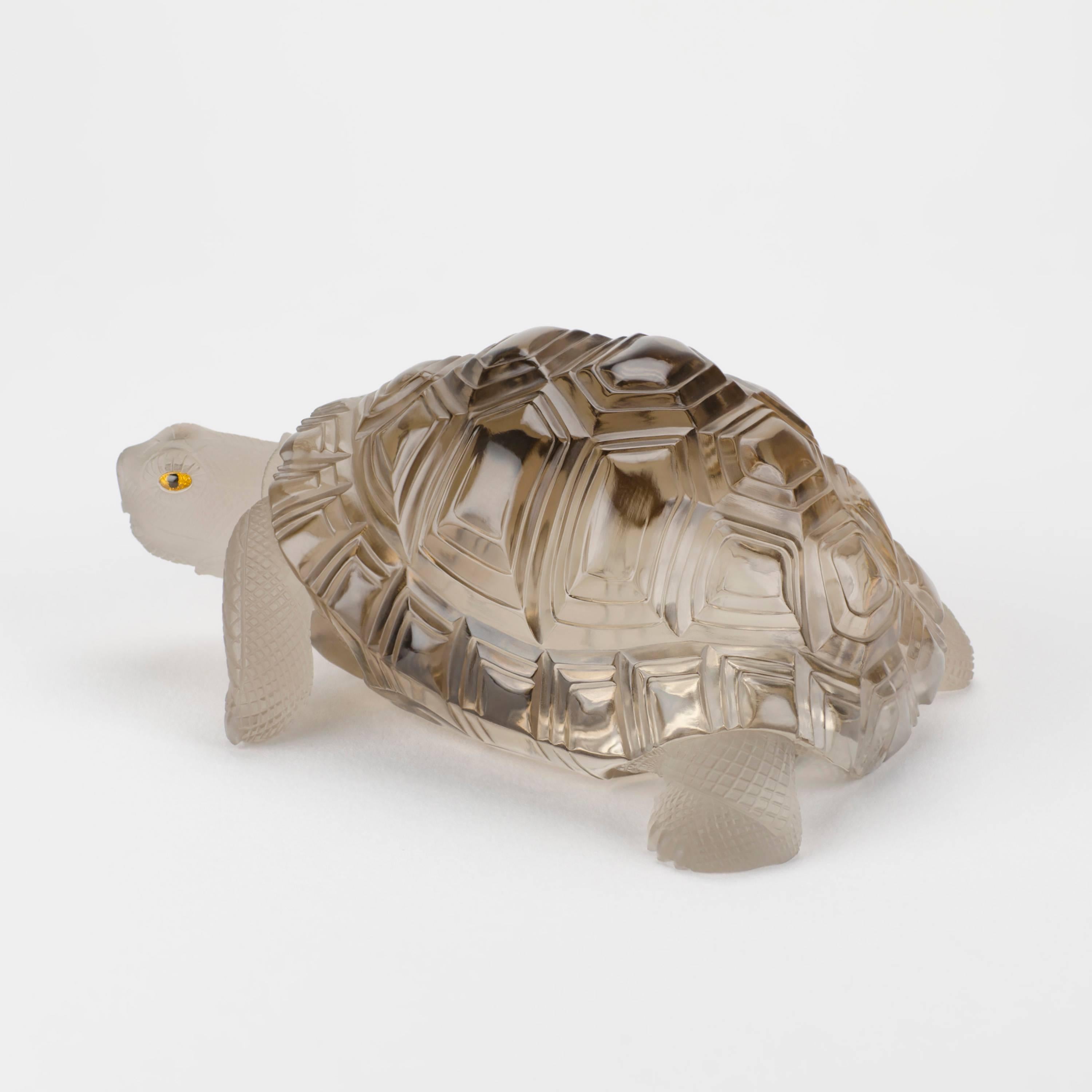 Turtles have always been immensely popular as charms and talismans and our beautifully rendered smoky quartz sculpture is a perfect candidate for the discerning collector.
Although it is unsigned it is an authentic Henn piece, carved in