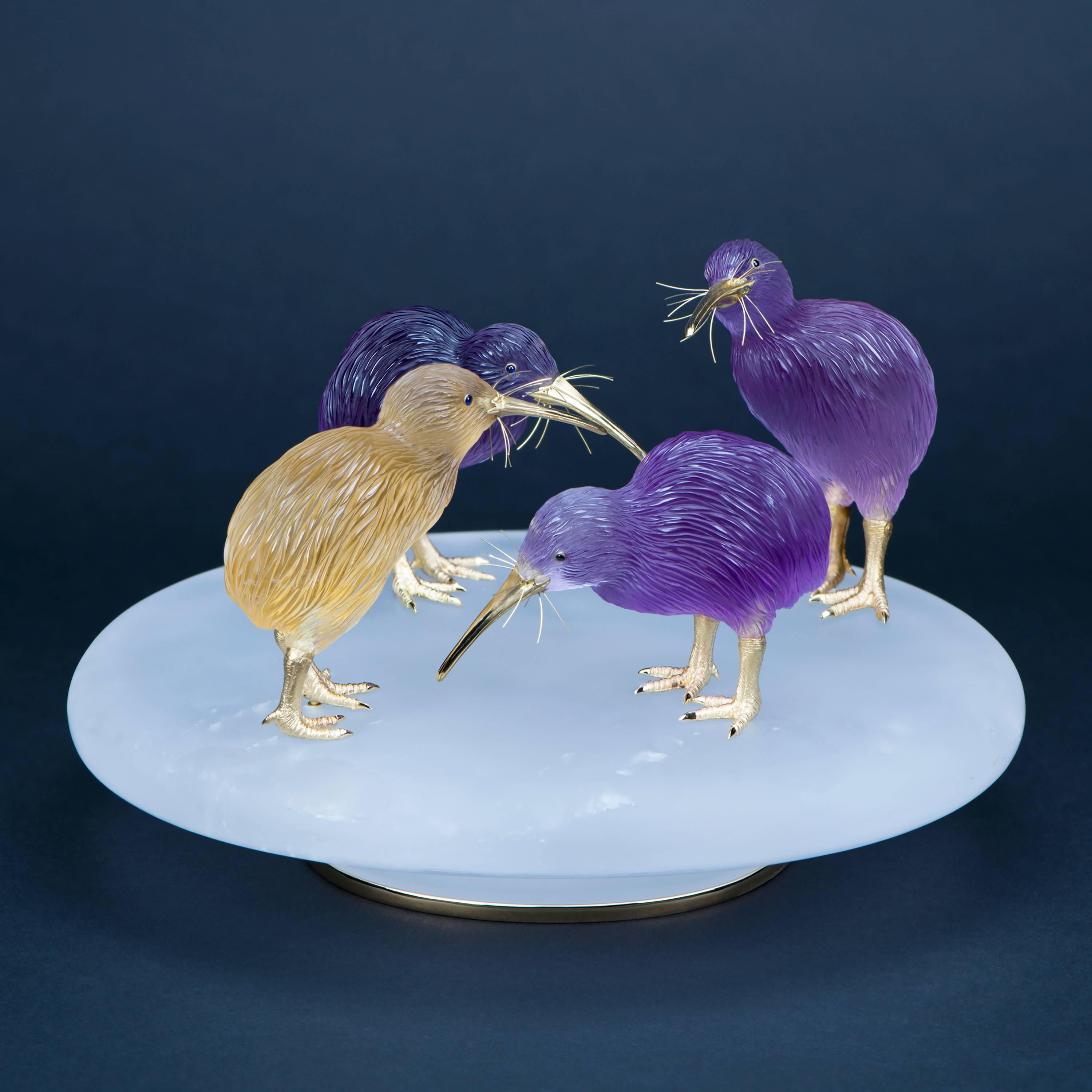 This endearing and beautifully rendered group of kiwis is the perfect centrepiece for a table or sideboard at home, or a creative office desk. 
Carved by hand, the piece features a trio of kiwis in precious amethyst and a single citrine bird, all