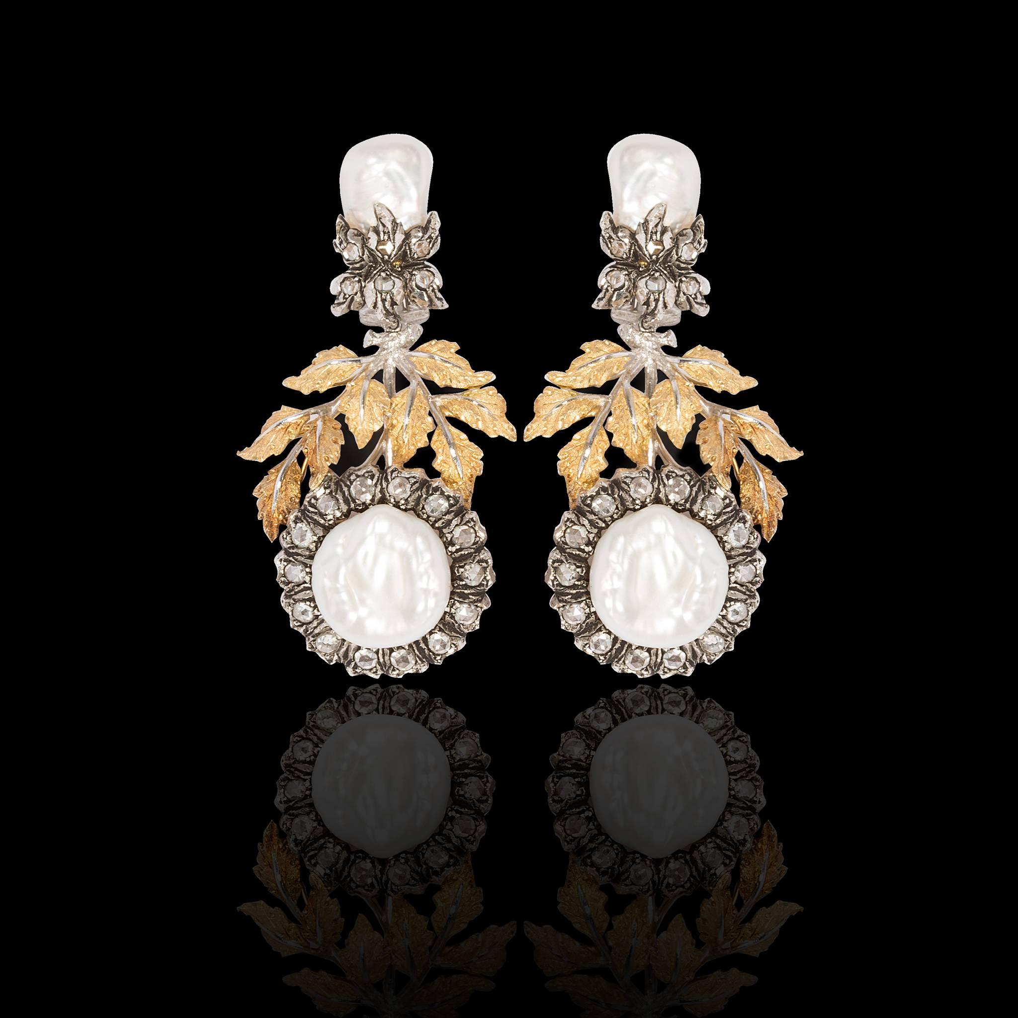 -Buccellati (Italien jeweller since 1919)pendant earrings in 18 carats gold ,baroque pearls and mother -of- pearl earrings.
-Gold:18 carats .
-Diamonds:40 rose-cut diamonds .
-Earpierce clip fitting.
-Signed :Gianmaria Buccellati ITALY.
-Numbered