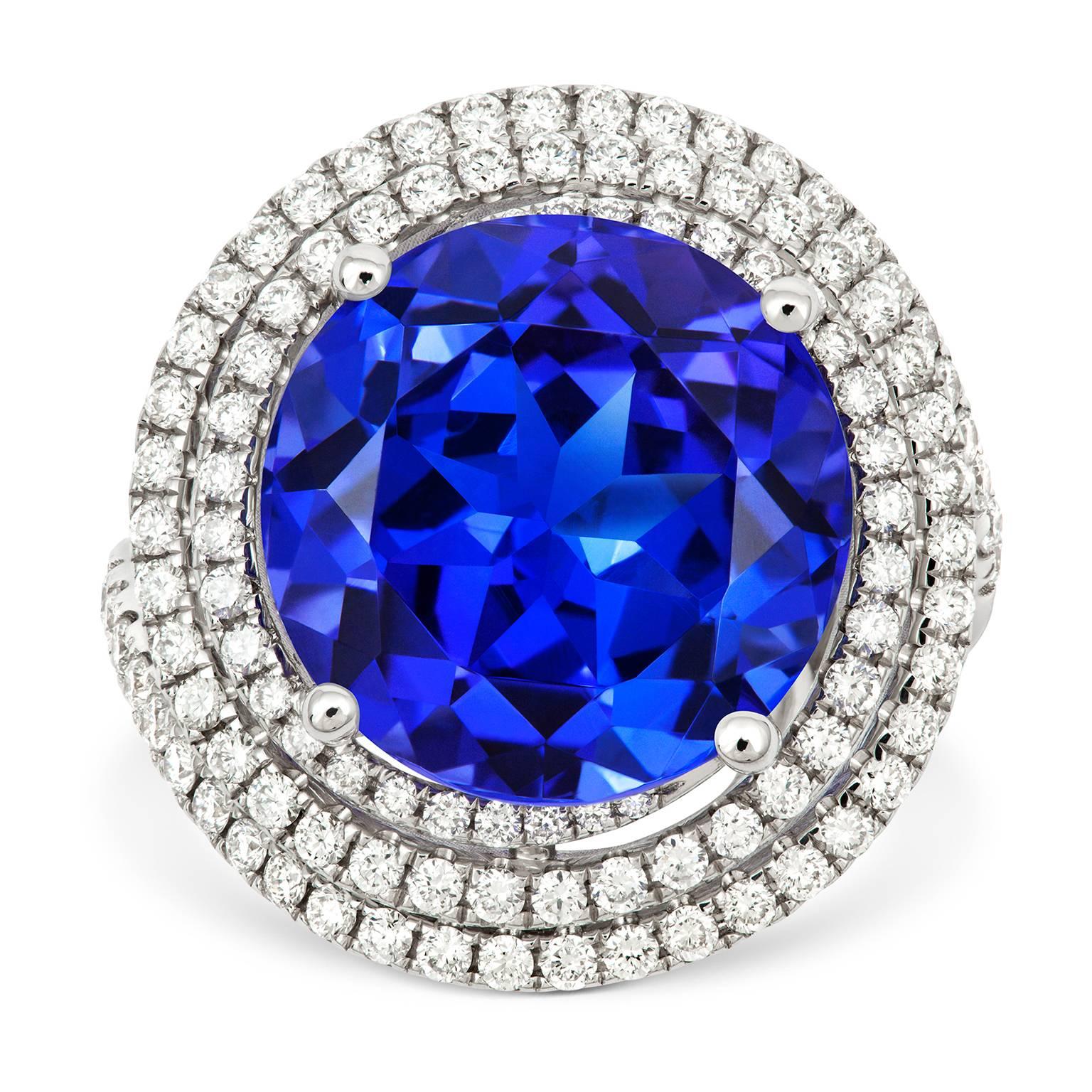 TRANSFIXING! Set in 18ct white gold with 1.00ct of glittering fine diamonds (G-VS) and a vivid 10.87ct AAAA diamond-cut, round-brilliant, super-fine Tanzanite gem. You simply can't take your eyes off this ring. A completely one-off exclusive