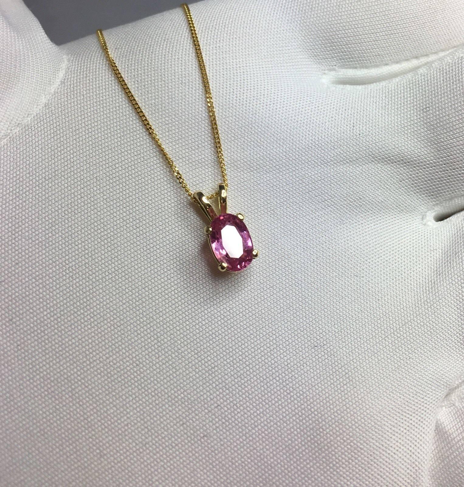 Natural vivid purple pink sapphire solitaire pendant.

Beautiful oval cut Ceylon Sapphire. Set in a fine 18k yellow gold pendant setting.


Untreated and unheated. Very rare for Sapphires. Particularly where colour is so vivid. 

1.09 carat stone