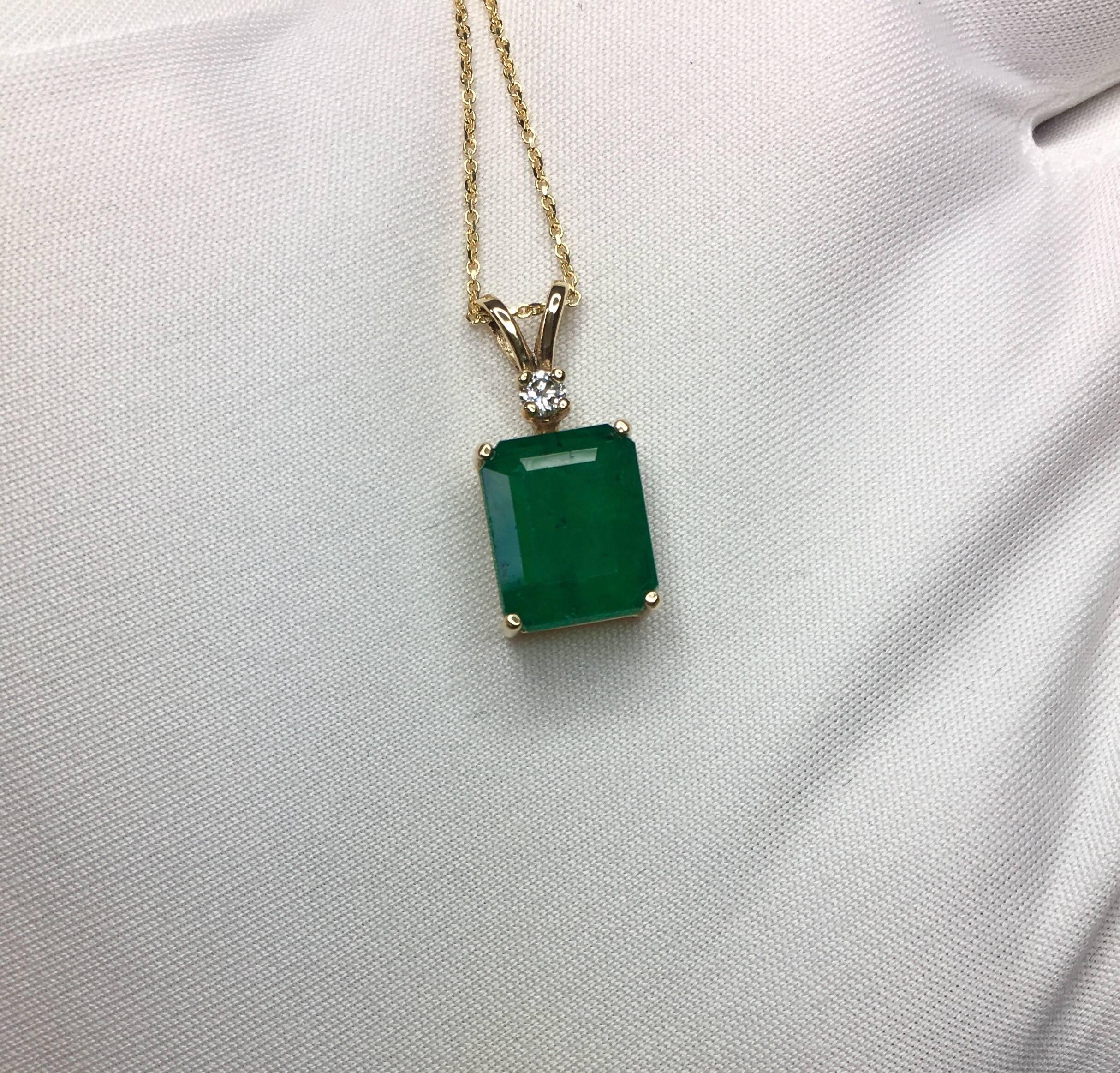 Fine natural deep green Zambian emerald 14k solitaire pendant with diamond accent.

Very large 4.51 carat stone with stunning deep green colour and good clarity. Obviously there are inclusions as shown in pictures and as to be expected with natural