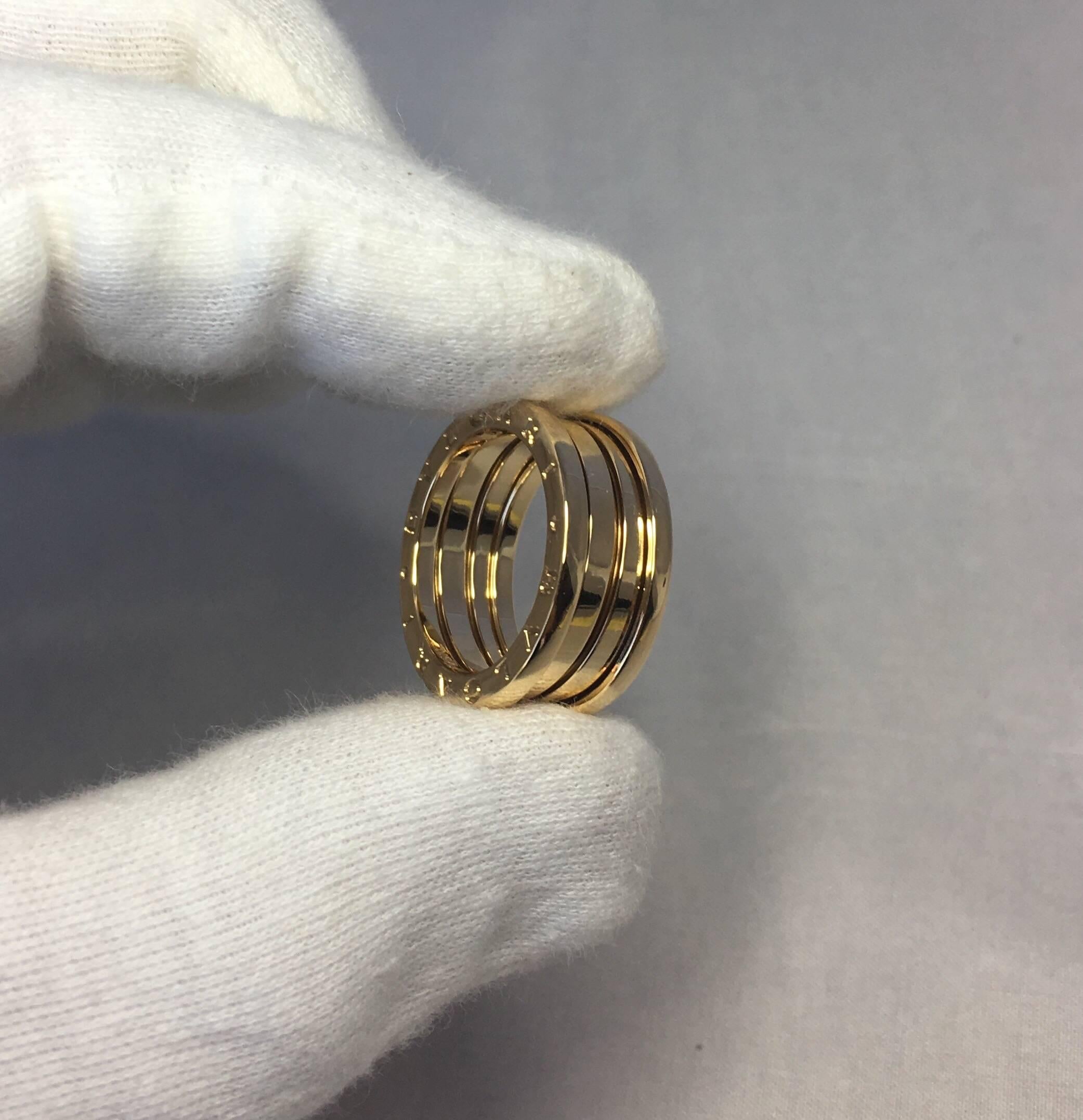 B.Zero1 3-band yellow gold ring. 18k. Very elegant and unique design 'spring' ring.

Comes with original bulgari packaging and boxes (shown in photos)

Basically new - has been professionally re-polished and cleaned. You'll struggle to find a single
