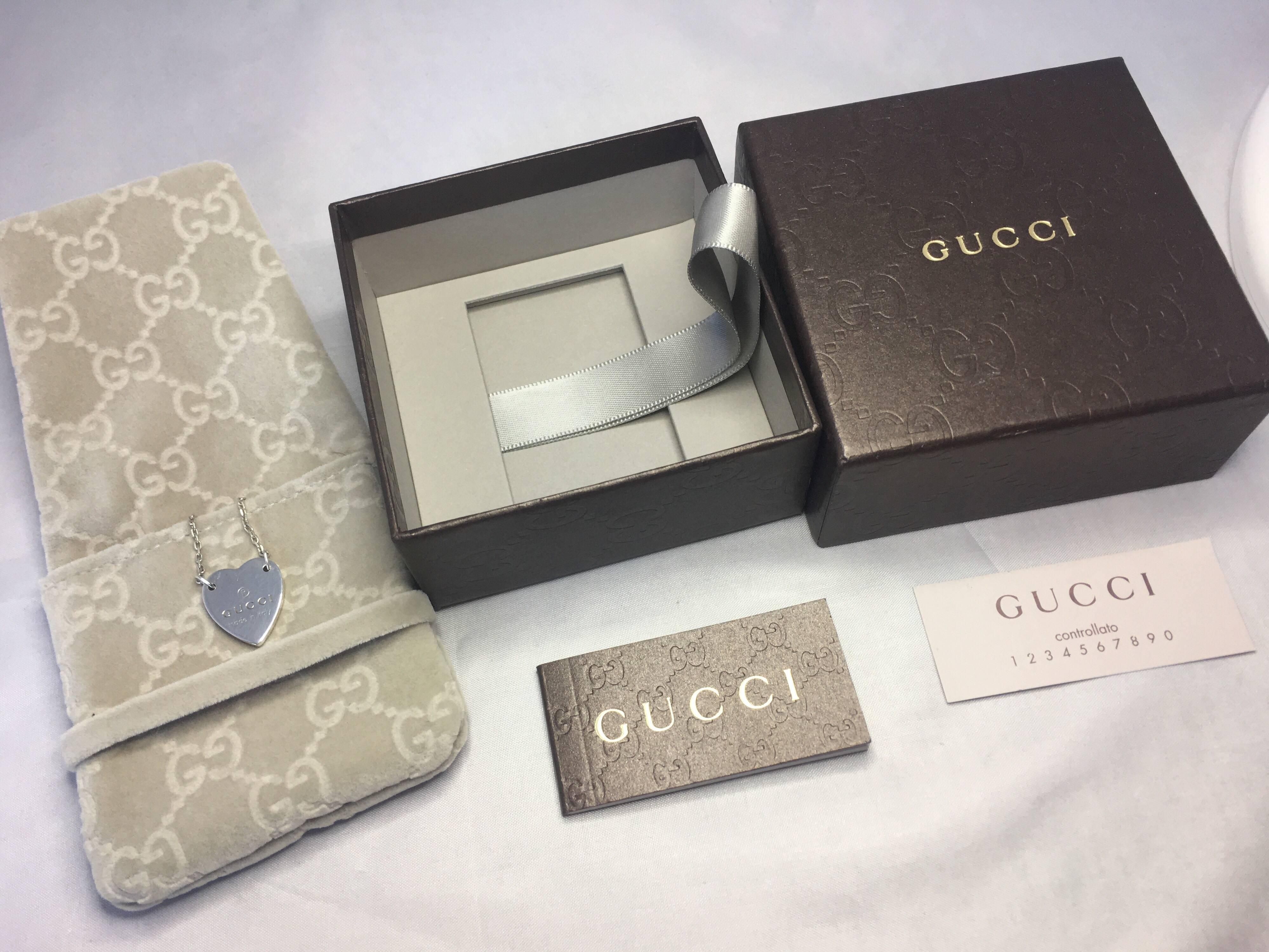 Gucci 'Made In Italy' silver heart pendant necklace. Comes with original Gucci box, pouch and paperwork.

Used item, some minor scratches on it. Has been professionally cleaned and polished so very bright and shiny.

Chain can be worn at two lengths
